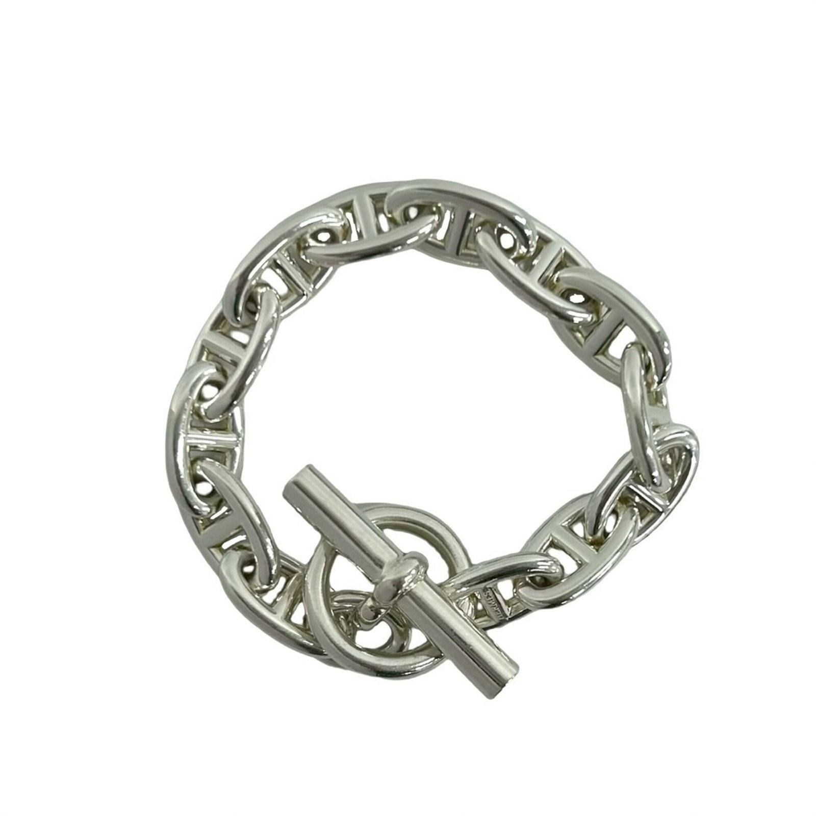 Silver Charm Bracelet 925 by Hermes: Silver Charm Bracelet 925 by Hermes Silver Charm Bracelet 925 by Hermes, a sophisticated accessory featuring the iconic charm style from the renowned French fashion house. This 20.5cm silver bracelet 