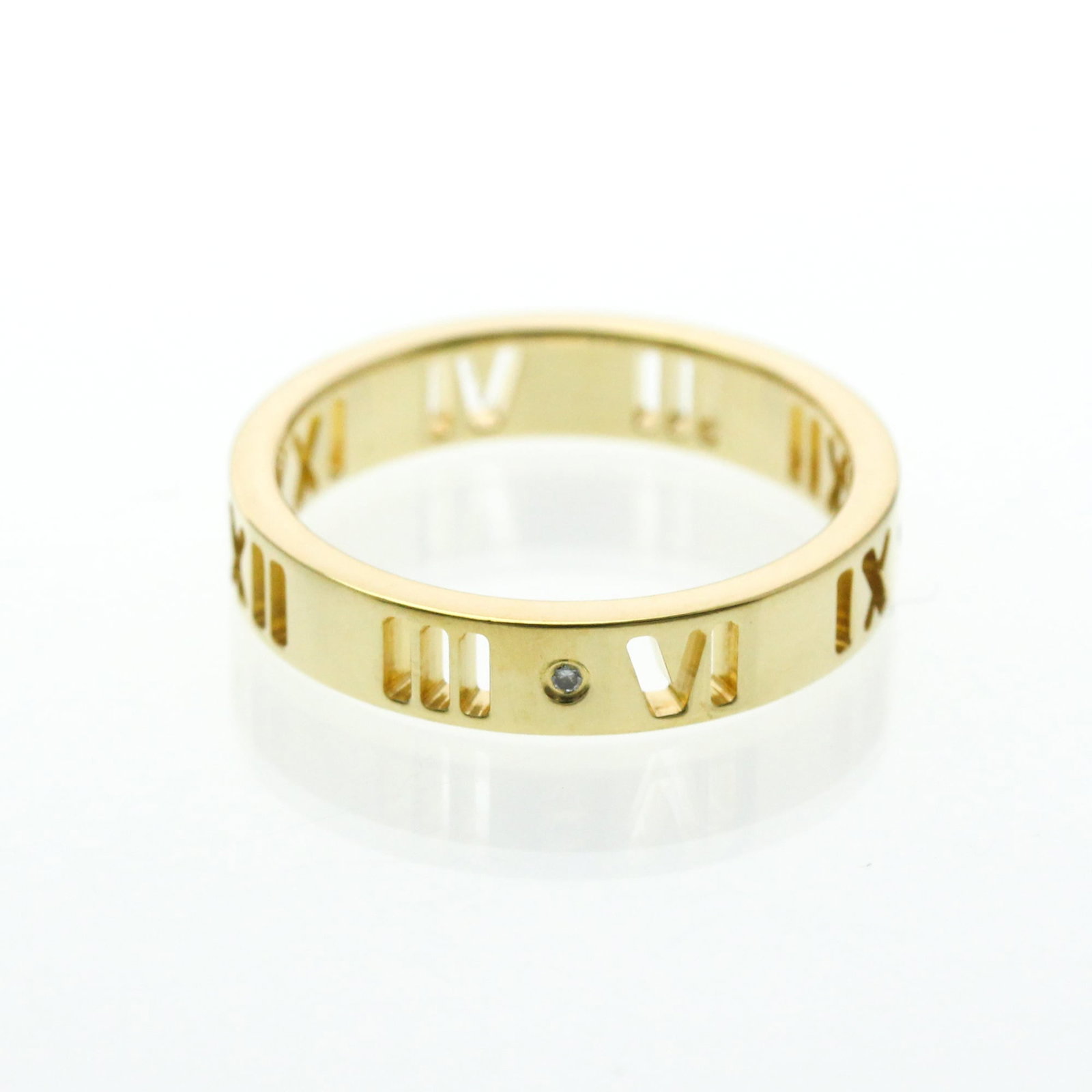 Tiffany Ring Gold Yellow 18K: Tiffany Ring Gold Yellow 18K Tiffany Ring Gold Yellow 18K - A Timeless Fashion Statement.This 18k yellow gold band ring features a diamond stone and boasts a classic Tiffany design. With its sleek 3.5