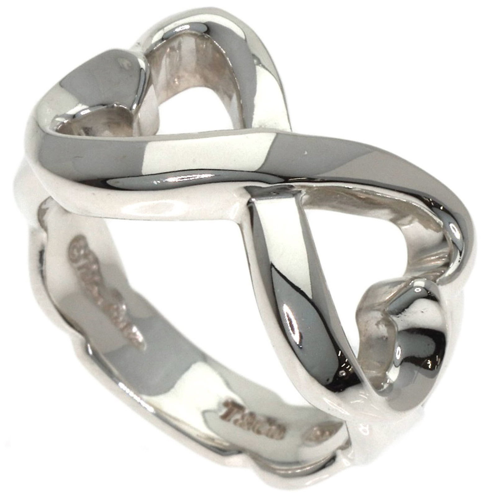 Silver Ring Tiffany Band: Silver Ring Tiffany Band Silver Ring Tiffany Band, a beautiful and elegant piece, bears the signature of its creator. Made from high-quality silver, this band features a classic design that suits wome