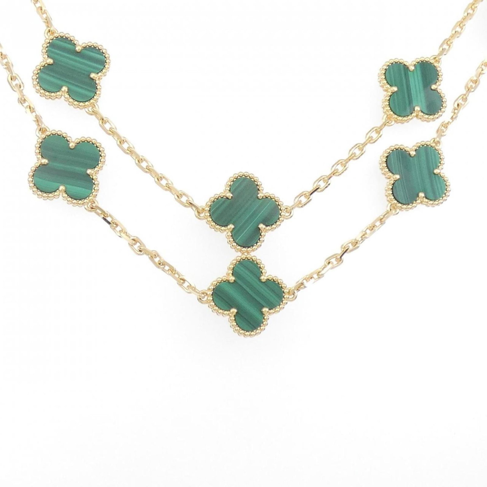 Vintage Alhambra Motif Necklace by Van Cleef Arpels: Vintage Alhambra Motif Necklace by Van Cleef Arpels Yellow gold (18K) necklace with an Alhambra motif pendant, measuring 15mm in diameter. The necklace features a 86cm circumference and bears the sign