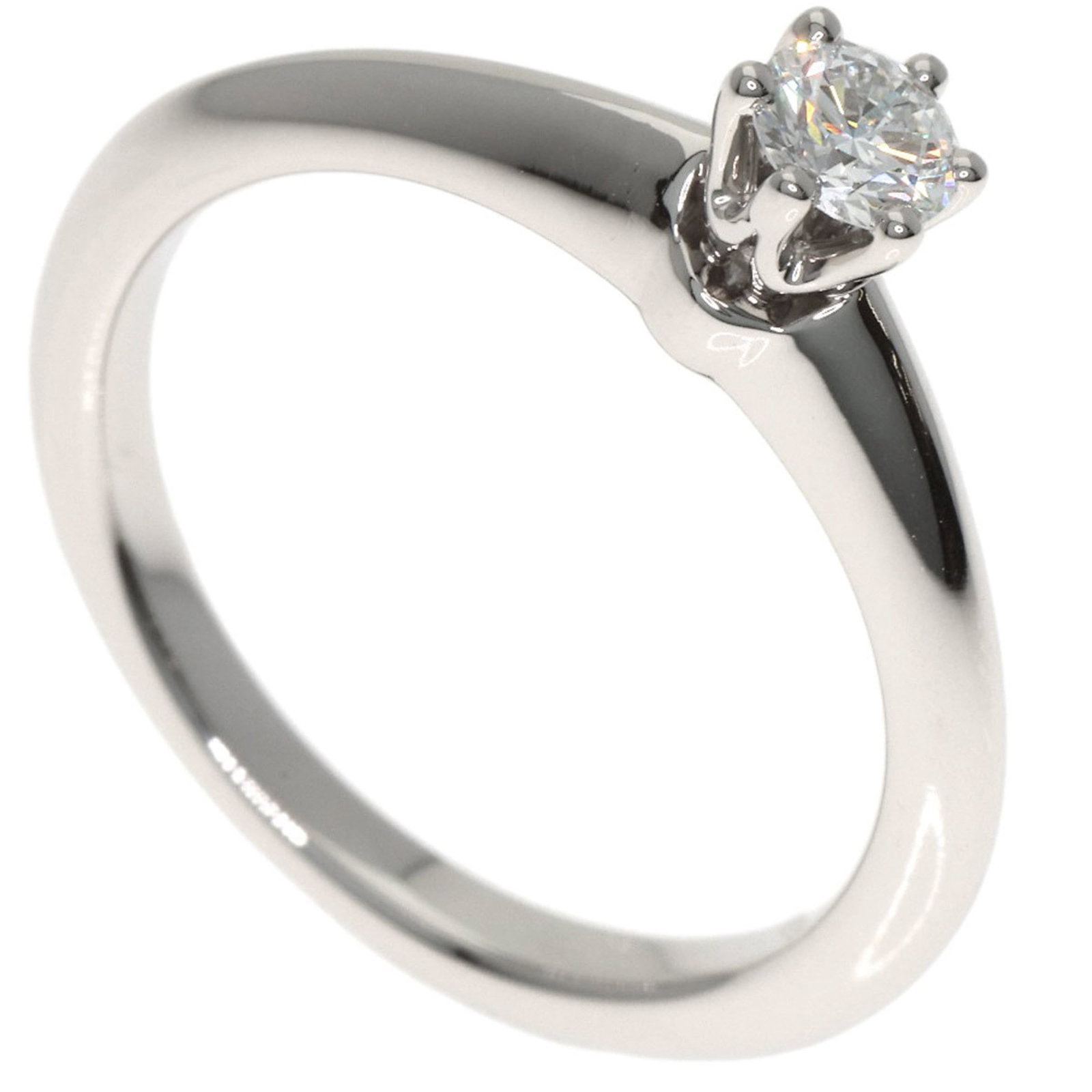 Platinum ring by Tiffany band: Platinum ring by Tiffany band Platinum ring by Tiffany features a high-quality band made from 950 platinum, with a classic design that exudes timeless elegance. The ring bears some minor traces of