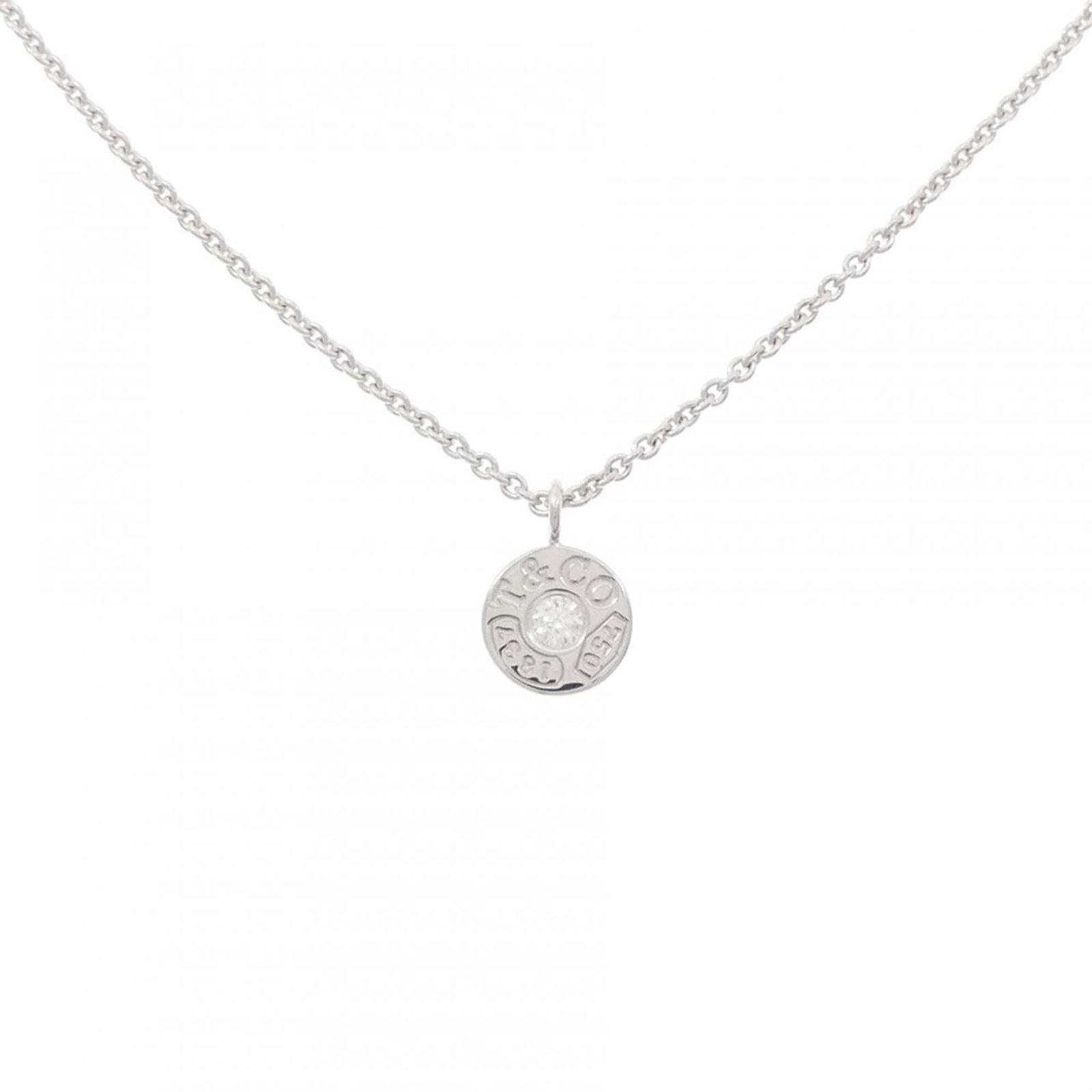 Tiffany necklace from 1837: Tiffany necklace from 1837 Tiffany necklace from 1837, featuring an 18K white gold pendant with a signature. This antique piece boasts a classic design and intricate details, showcasing the craftsmans
