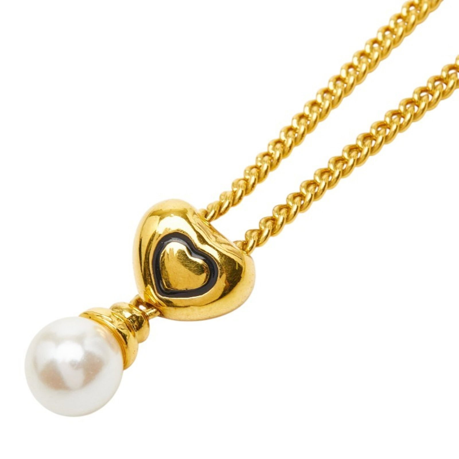 Christian Dior Heart Pendant Necklace Gold Plated Faux Women's: Christian Dior Heart Pendant Necklace Gold Plated Faux Women's Christian Dior Heart Pendant Necklace in Gold Plated Faux Women's. This gold plated necklace features an artificial pearl and a heart-sha