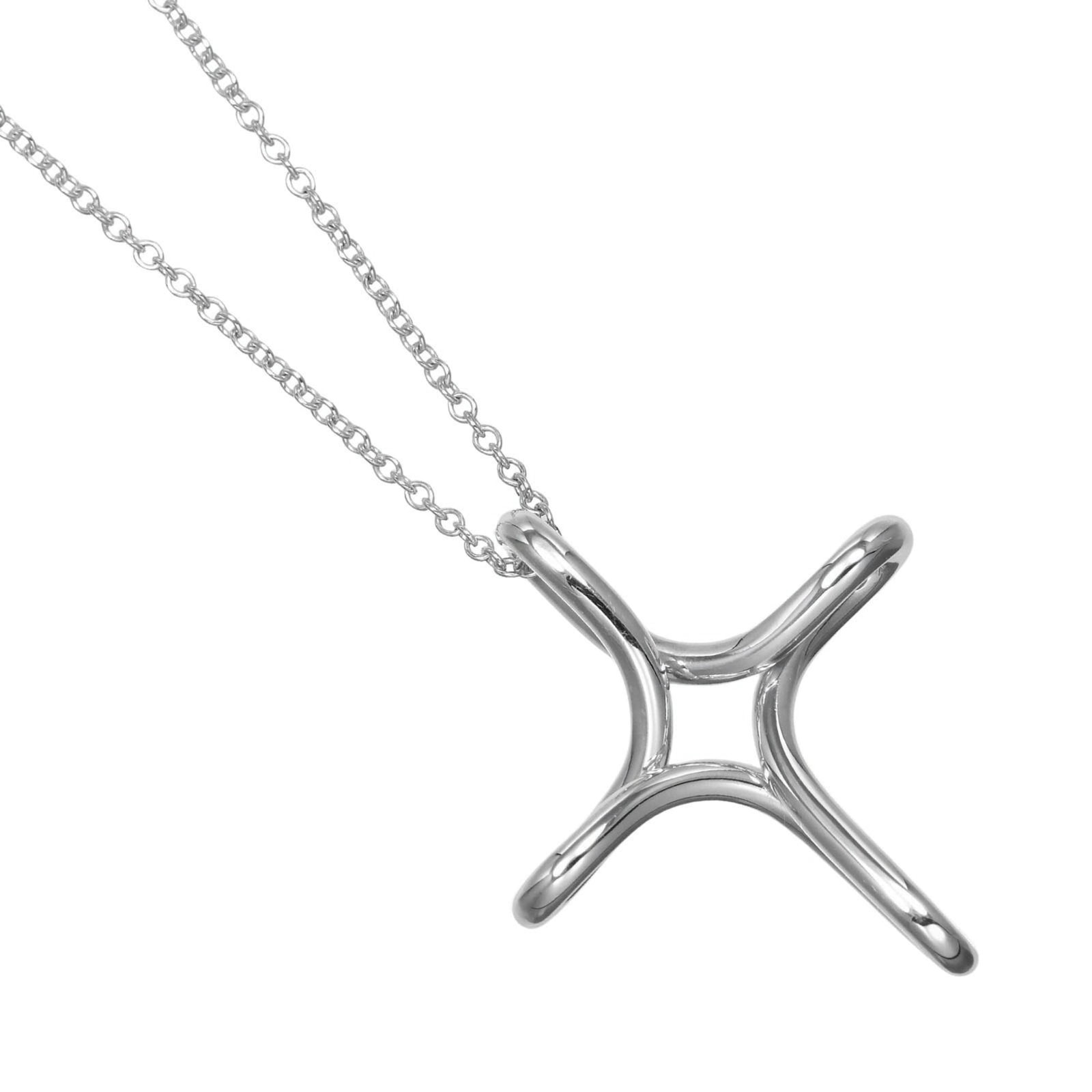 Tiffany & Co. Cross Necklace 925 Silver Approx. 3.25G: Tiffany & Co. Cross Necklace 925 Silver Approx. 3.25G Tiffany & Co. Cross Necklace in 925 Silver, a timeless piece with elegant simplicity. This sterling silver necklace features a 25mm x 21.3mm penda