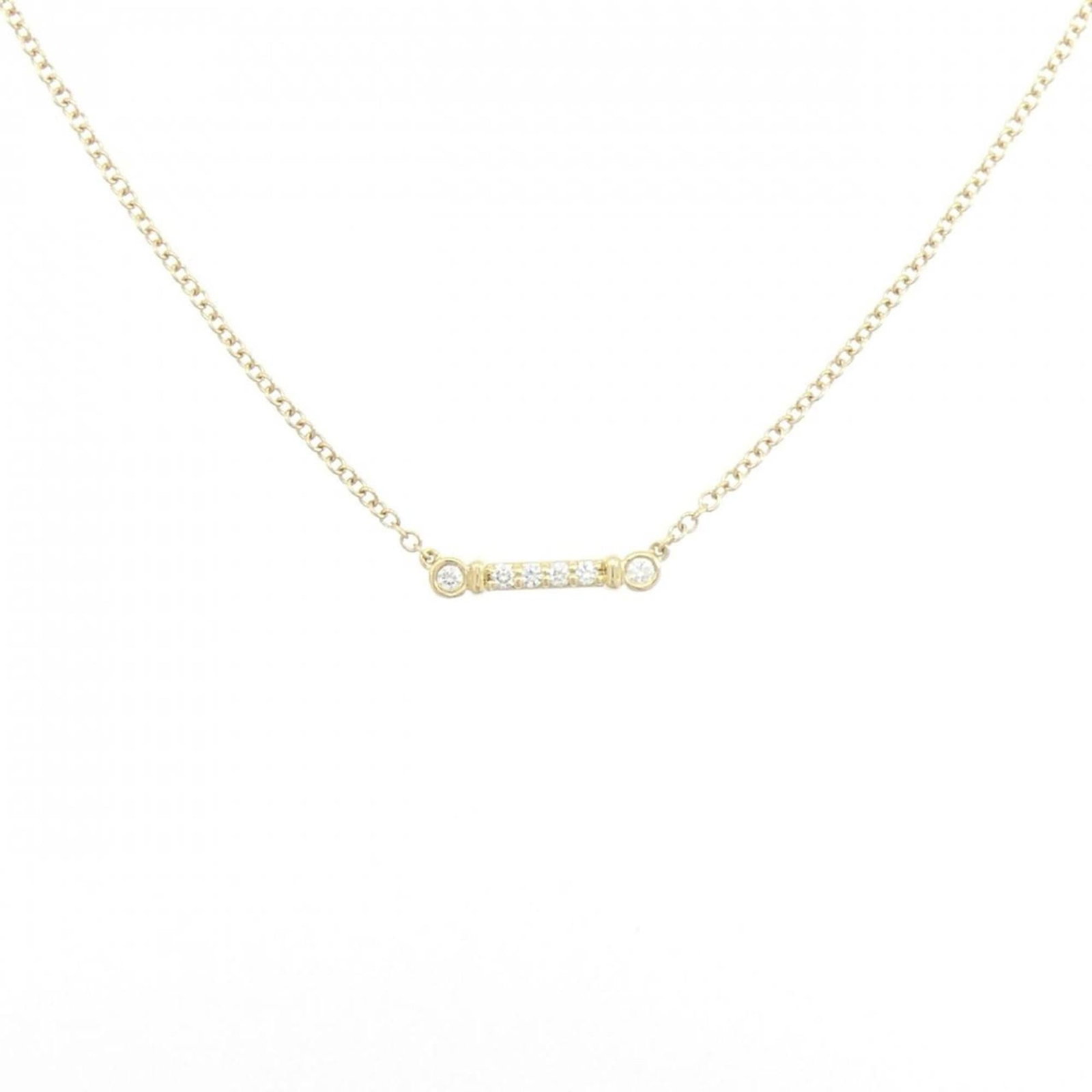 Fleur de lis stem necklace by Tiffany: Fleur de lis stem necklace by Tiffany Yellow gold Fleur de lis stem necklace by Tiffany features a 2.2mm x 11.9mm pendant with some scratches and dirt, still in very good condition. The delicate