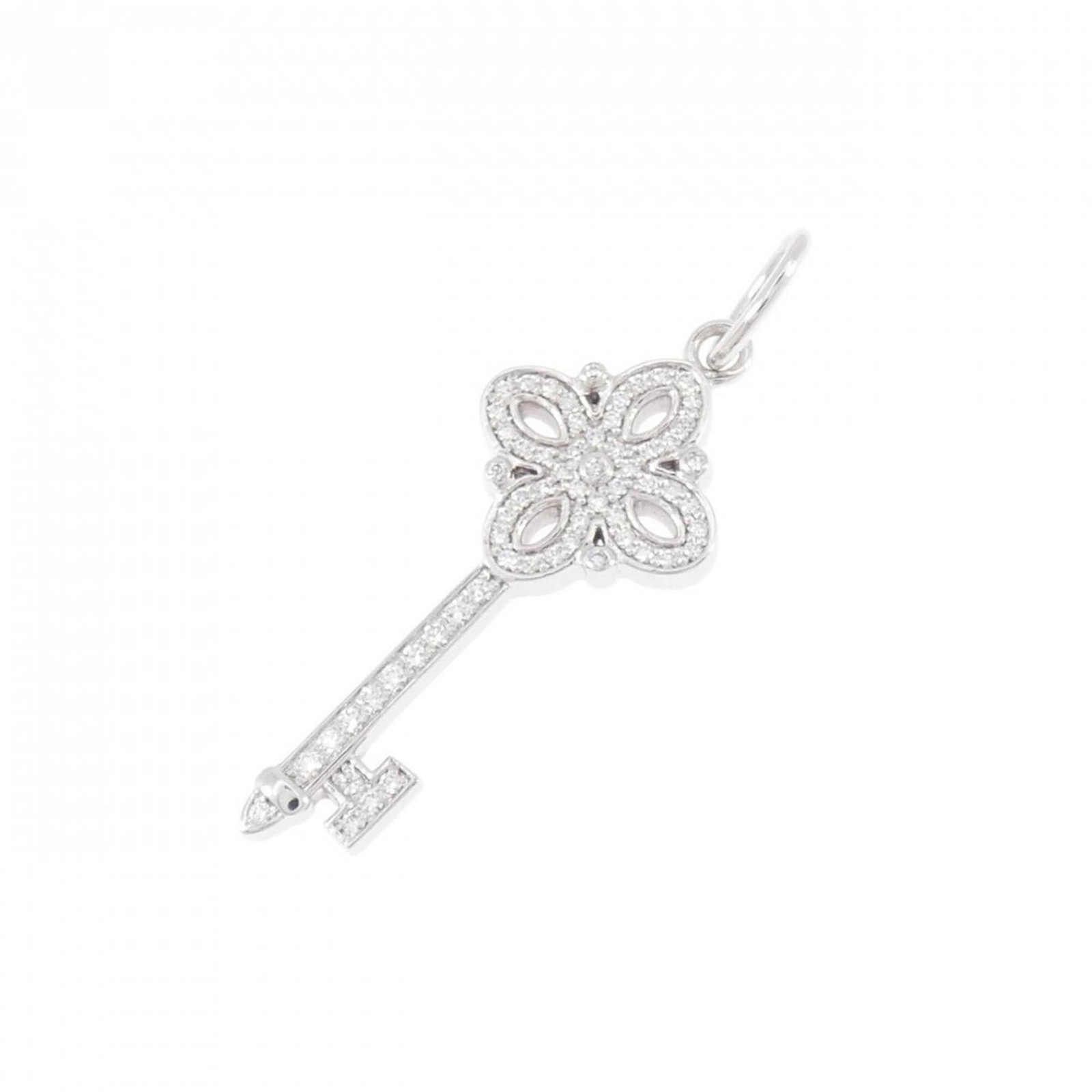 Victoria Key Mini Pendant: Victoria Key Mini Pendant White gold (18K) pendant featuring a diamond, measuring 29.8mm x 10.4mm, with some scratches and dirt present but overall in very good condition. The pendant bears a signatur