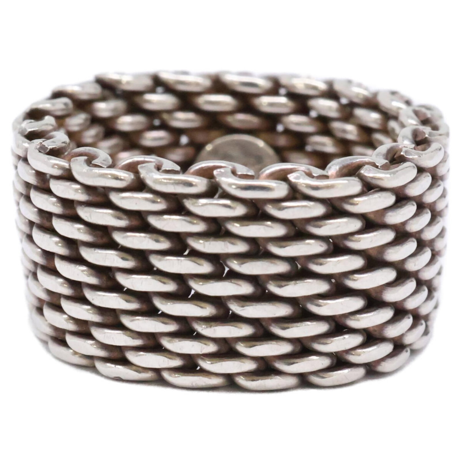 Tiffany Band Ring Silver 925: Tiffany Band Ring Silver 925 Silver 925 band ring from Tiffany, featuring a classic design with subtle wear from previous use. The ring bears traces of usage and minor scratches, but remains in good c