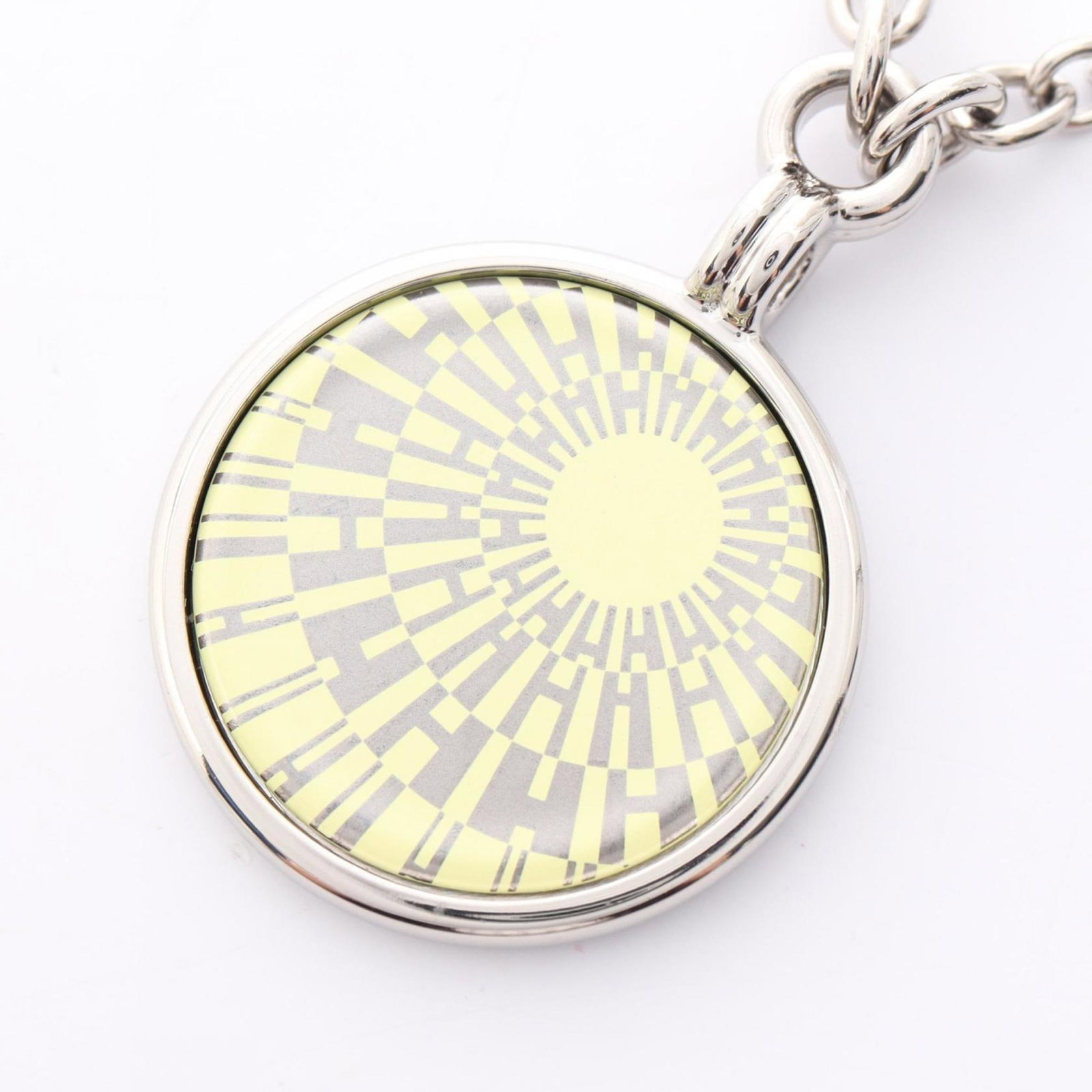 Hermes Herms Op'H Medal Necklace In Stainless Steel For Women Silver And Yellow.: Hermes Herms Op'H Medal Necklace In Stainless Steel For Women Silver And Yellow. Stainless steel pendant in silver and yellow hues, measuring 23mm x 23mm. The Hermes Herms Op'H Medal Necklace features
