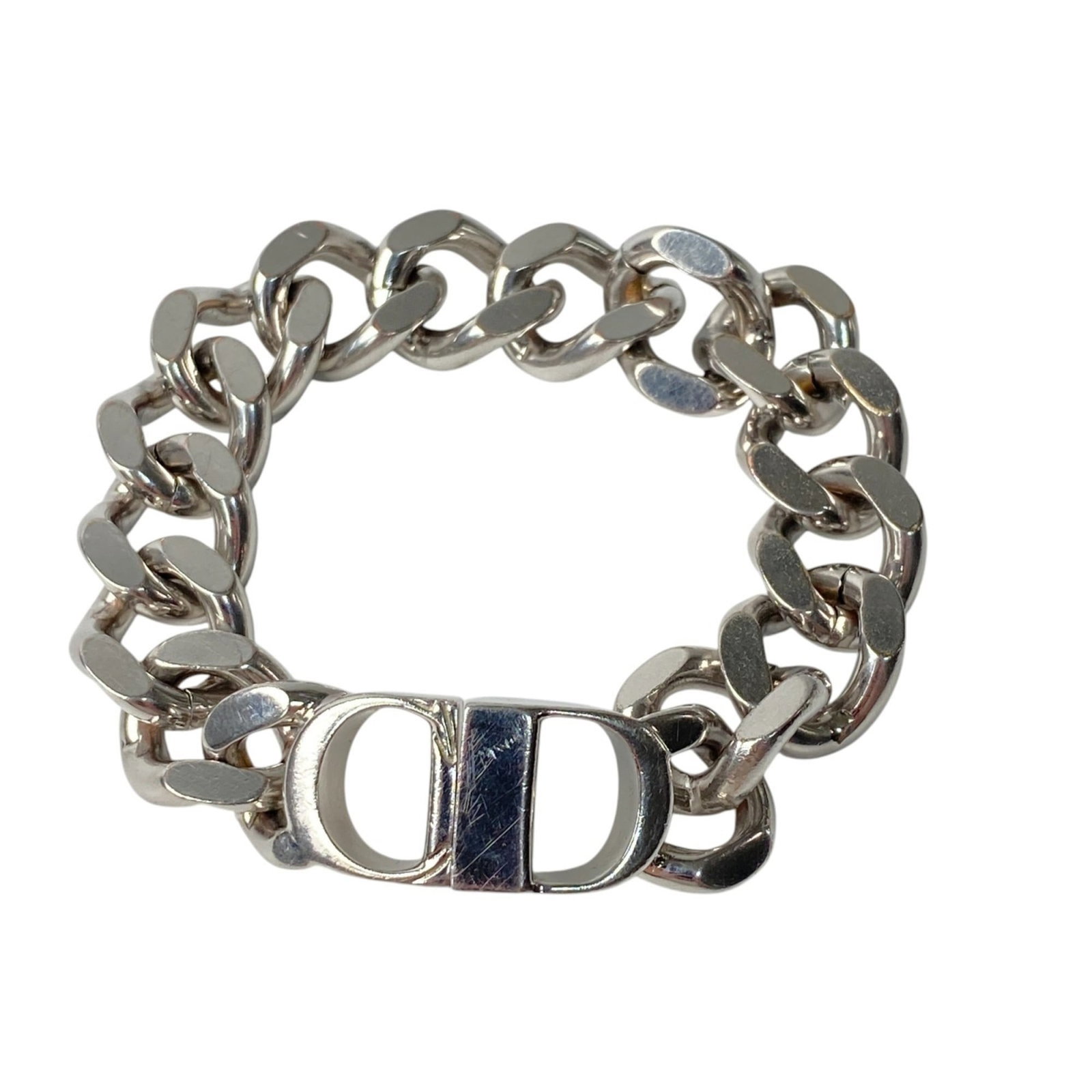 Christian Dior Charm Steel Stainless: Christian Dior Charm Steel Stainless Silver Charm Steel Stainless Christian Dior bracelet with a length of 16cm / 6.29'' and some traces of usage, including scratches and dirt, but overall in very goo
