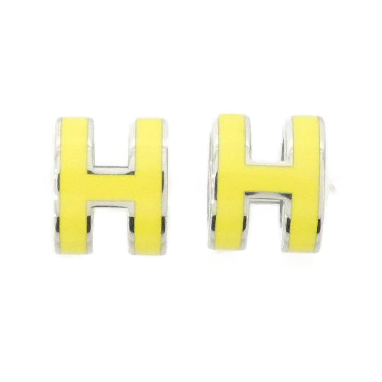 Hermes Stud Earrings: Hermes Stud Earrings Stud earrings with a lime, silver, and yellow finish, measuring 9.00mm x 7.00mm in size, bearing a few traces of usage and minor scratches/dirt. The condition is described as