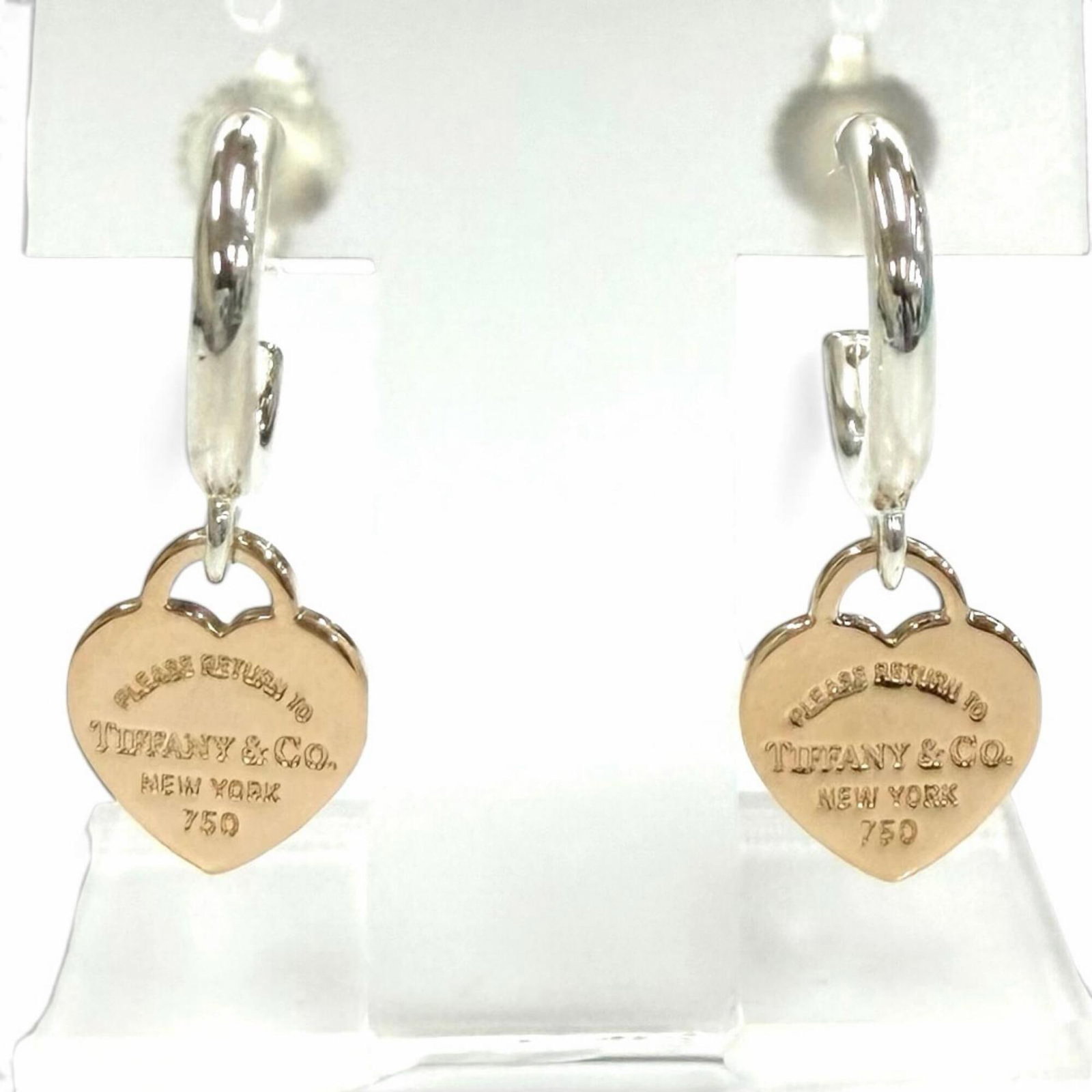 Pink Gold 18K Silver 925 Tiffany Hoop Earrings: Pink Gold 18K Silver 925 Tiffany Hoop Earrings Pink Gold 18K Silver 925 Tiffany Hoop Earrings are made from high-quality materials, featuring pink gold and silver 925. These earrings have a nice,