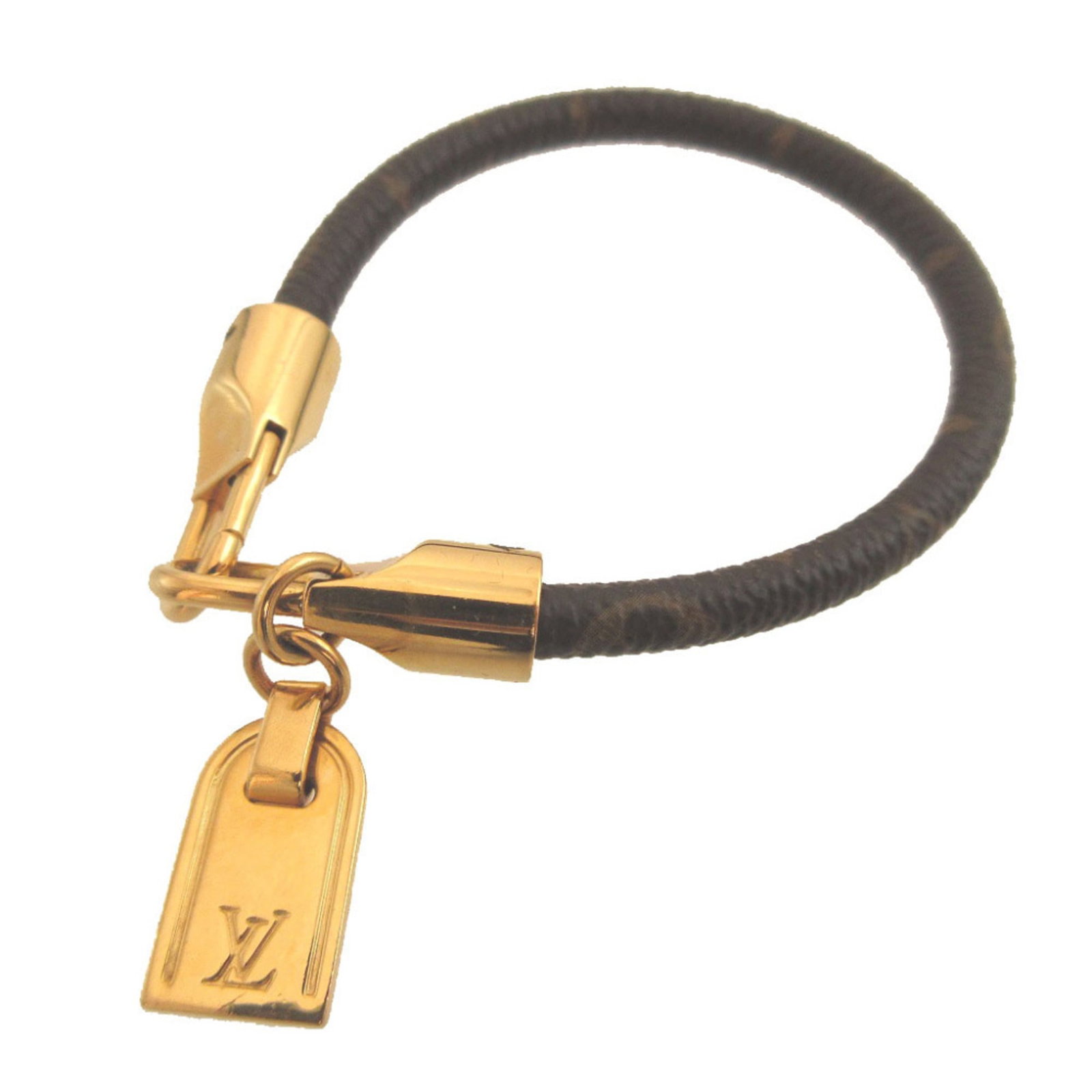 Louis Vuitton Monogram Bracelet: Louis Vuitton Monogram Bracelet Brown, Gold Monogram Charm Bracelet from Louis Vuitton. This 18.3cm / 7.2'' charm bracelet features the iconic monogram pattern in brown and gold tones, showcasing a cl