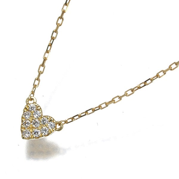 Ahkah Necklace Diamond 0.05Ct Heart Pave 18K 750 Yellow Gold: Ahkah Necklace Diamond 0.05Ct Heart Pave 18K 750 Yellow Gold 18k yellow gold heart-shaped pendant features a natural diamond pave setting, showcasing a 0.05 carat center stone. The delicate design mak