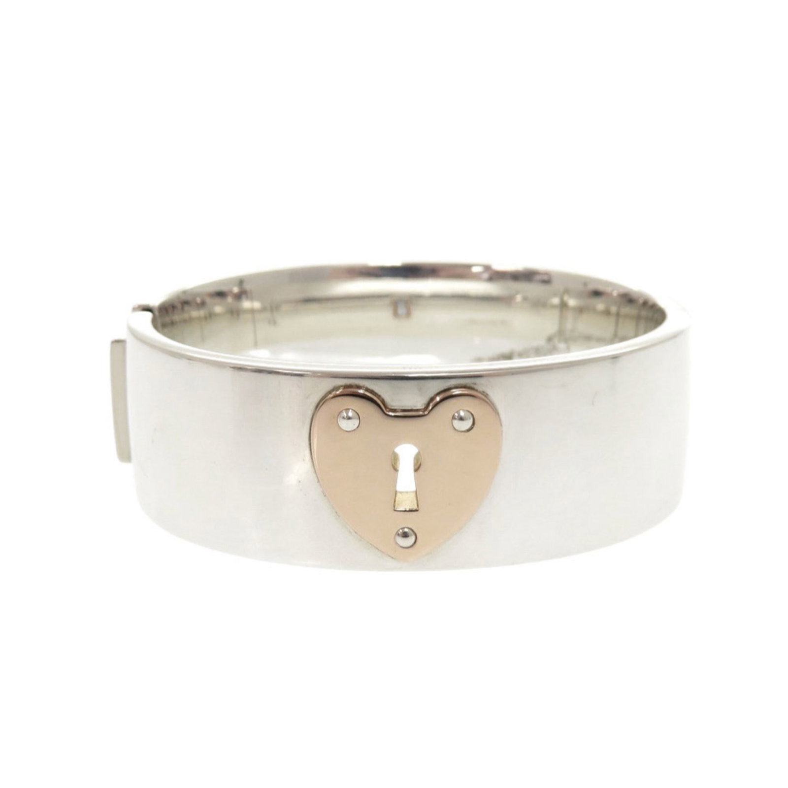 Tiffany Bangle Pink Gold Silver 925: Tiffany Bangle Pink Gold Silver 925 Tiffany Bangle Pink Gold Silver 925 - A Timeless Accessory in Excellent Condition. This beautiful bangle features pink gold and silver accents, with a sleek design 