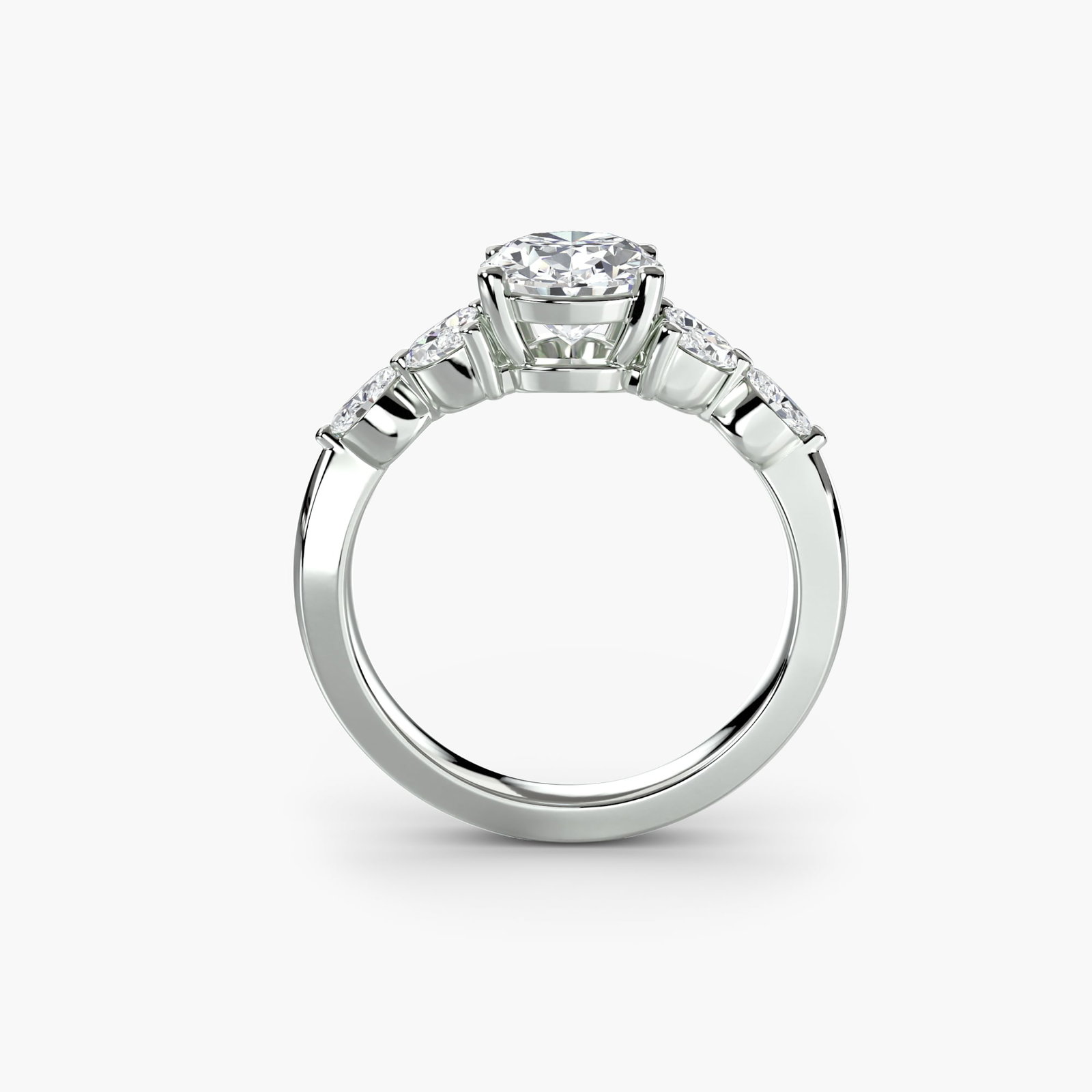 Side Stone Oval 14Kt White Gold Ring Setting: Side Stone Oval 14Kt White Gold Ring Setting 14Kt White Gold Oval Ring Setting with Six Side Stones. This elegant ring setting boasts six lab-grown side stones, totaling 0.336 carats, set in a sturdy