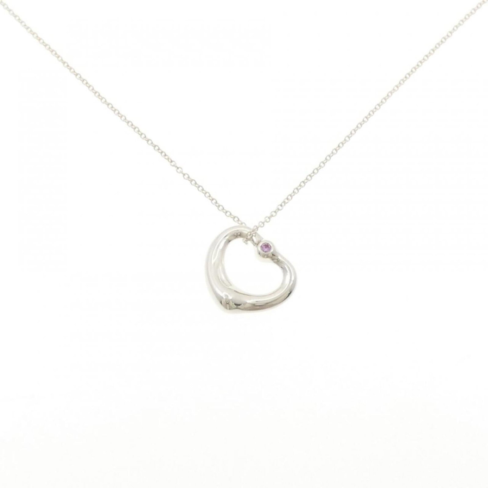 Heart Open Tiffany Necklace: Heart Open Tiffany Necklace Tiffany Necklace Type Pendant in Silver with Sapphire Stone, featuring a classic design. The necklace measures 40 cm in circumference and the pendant itself is 14.8mm x 13.
