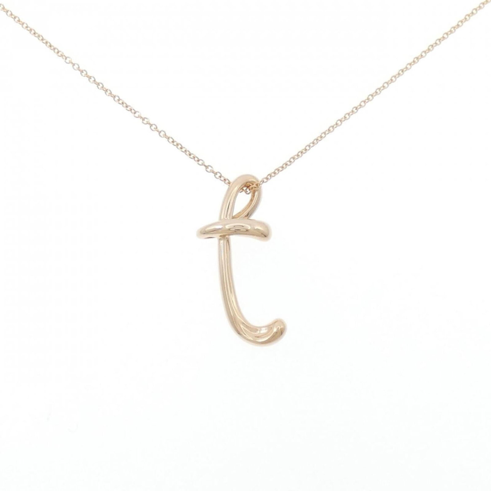 Letter Tiffany Necklace: Letter Tiffany Necklace Pink Gold (18K) pendant necklace with a delicate design, featuring a beautiful pink gold hue. The necklace measures 40 cm in circumference and has a pendant size of 21.2mm x 10