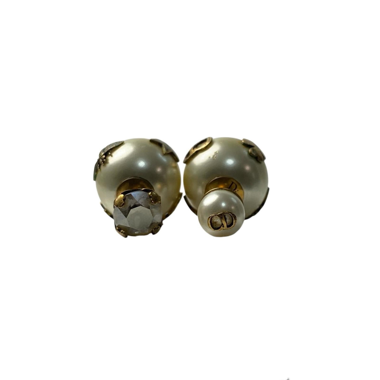 Christian Dior Stud Earrings Artificial Pearl: Christian Dior Stud Earrings Artificial Pearl Stud earrings from Christian Dior's collection feature artificial pearl details in a multi-color design. The condition shows some traces of usage, with