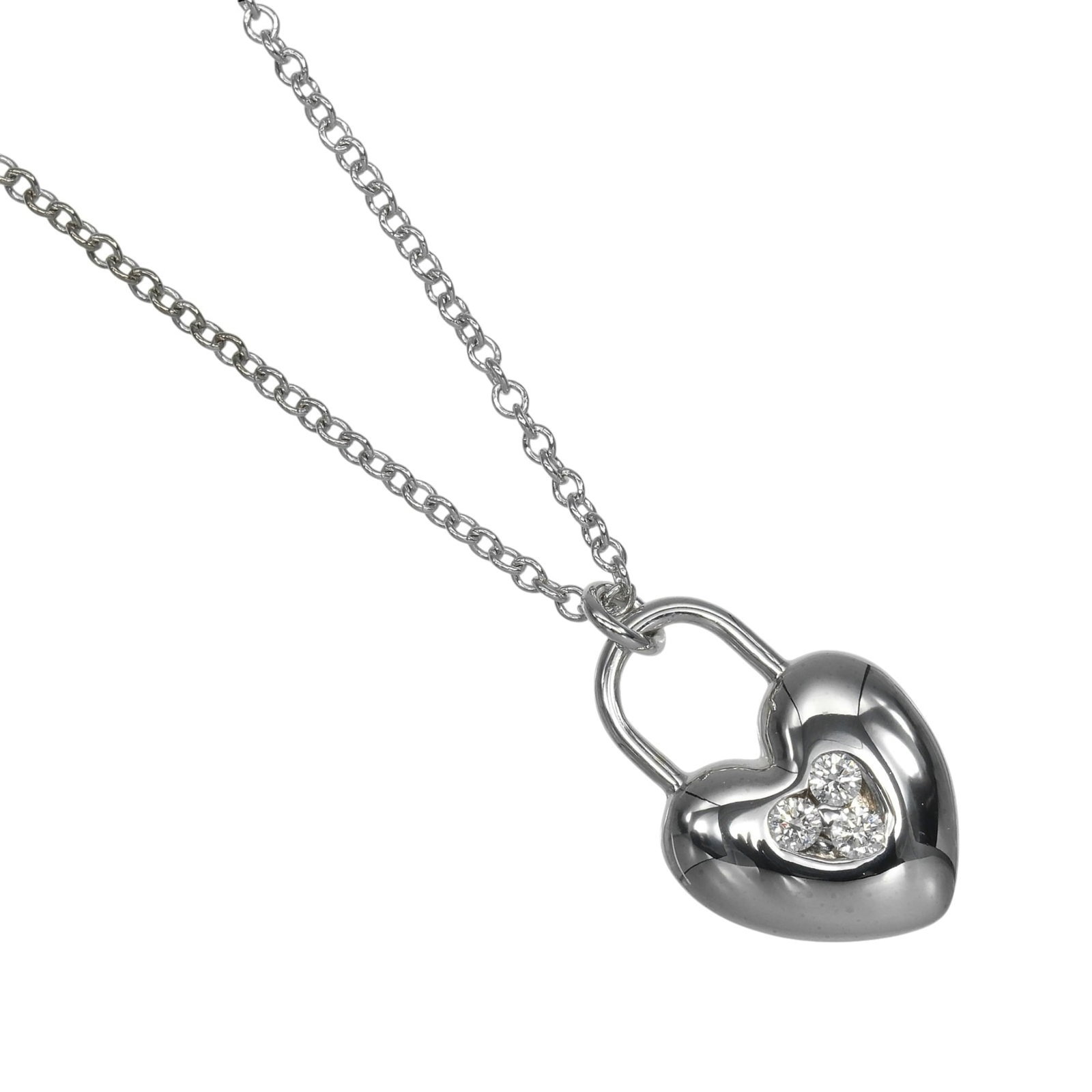 Tiffany & Co. Heart Lock Necklace 18K White Gold Diamond Approx. 3.22G.: Tiffany & Co. Heart Lock Necklace 18K White Gold Diamond Approx. 3.22G. Tiffany & Co. Heart Lock Necklace in 18K White Gold features an impressive diamond weighing approximately 3.22g, set within a st