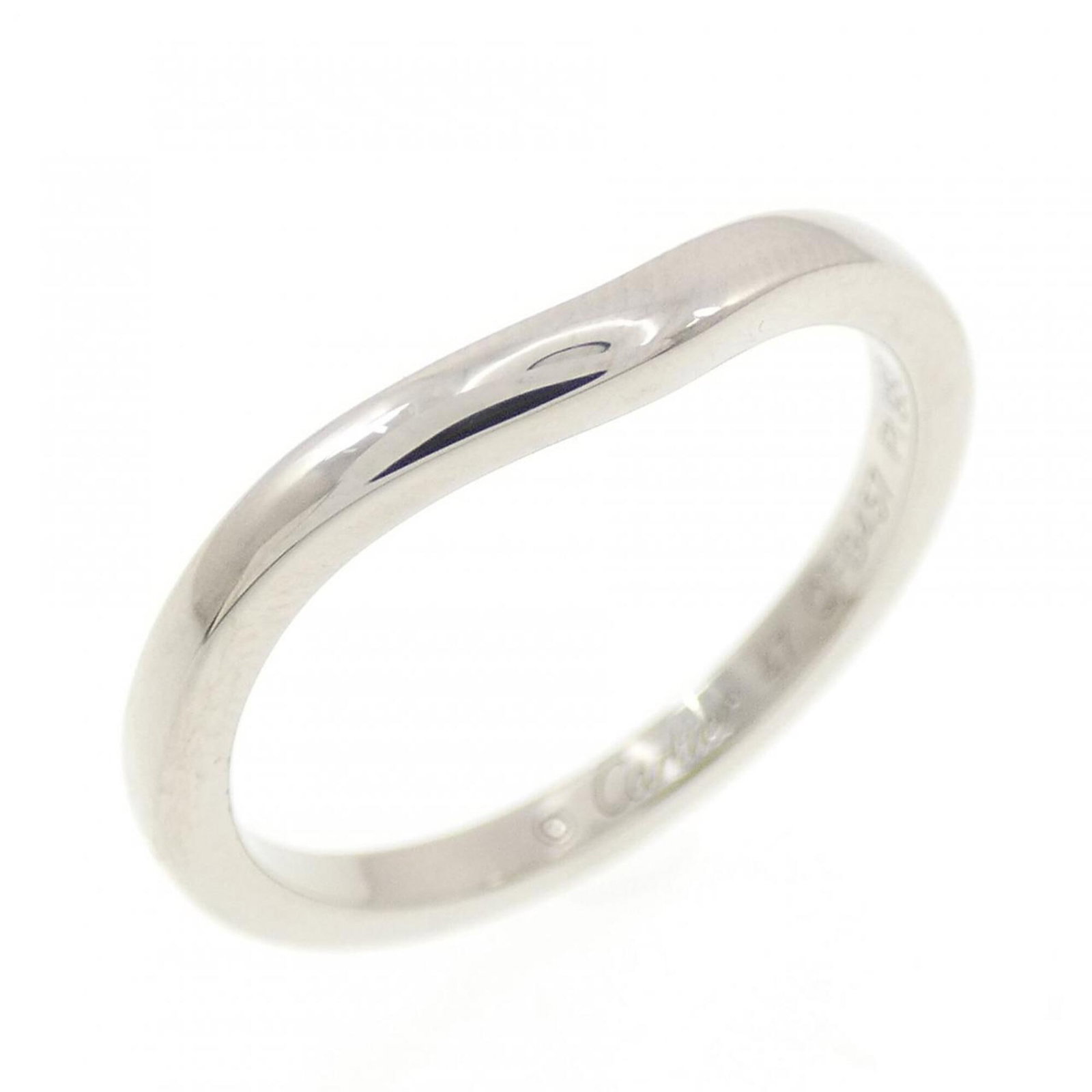 Ring Band by Platinum 950: Ring Band by Platinum 950 The Cartier Ring Band in Platinum 950 features a sleek design, with a few traces of usage visible on the surface. The band bears a signature, indicating that it was created b