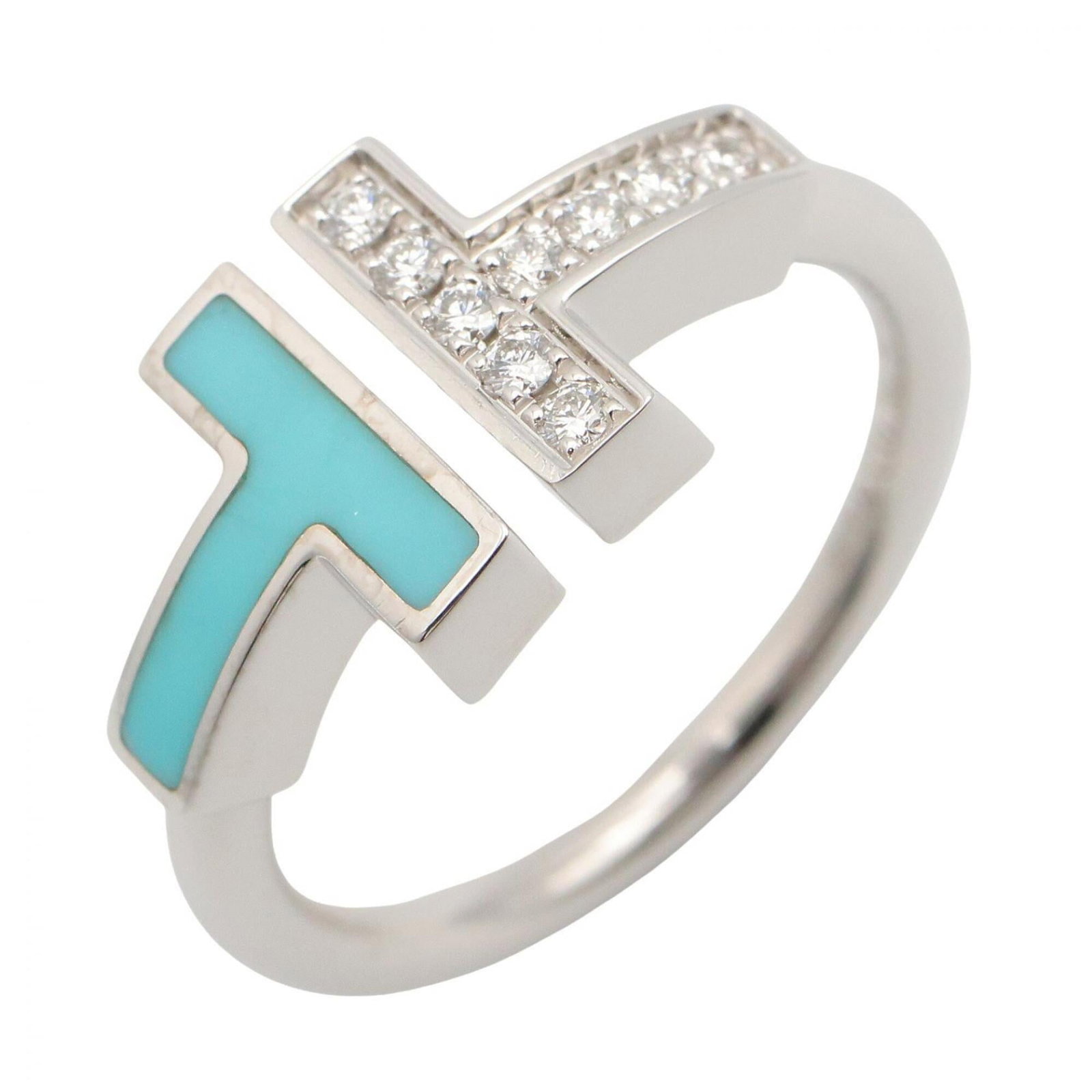 Tiffany Band Ring White Gold (18K): Tiffany Band Ring White Gold (18K) 18K White Gold Tiffany Band Ring in White and Blue. This used band ring features turquoise and diamond accents, set in high-quality white gold. With some minor scrat