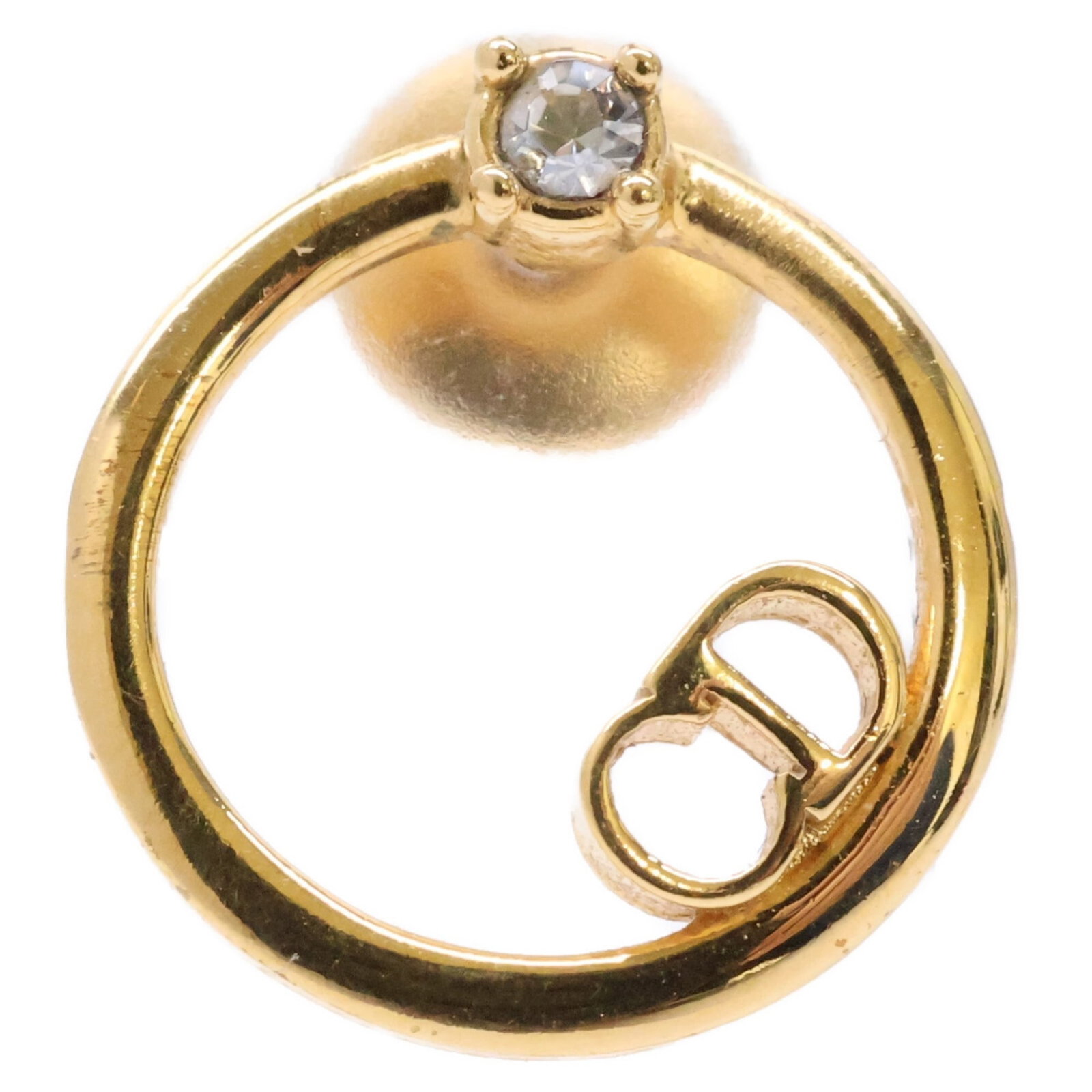 Stud Earrings by Metal from Christian Dior: Stud Earrings by Metal from Christian Dior Stud earrings by Metal from Christian Dior, featuring a gold finish. The earrings measure 11.50mm x 11.00mm and have traces of usage with minor scratches