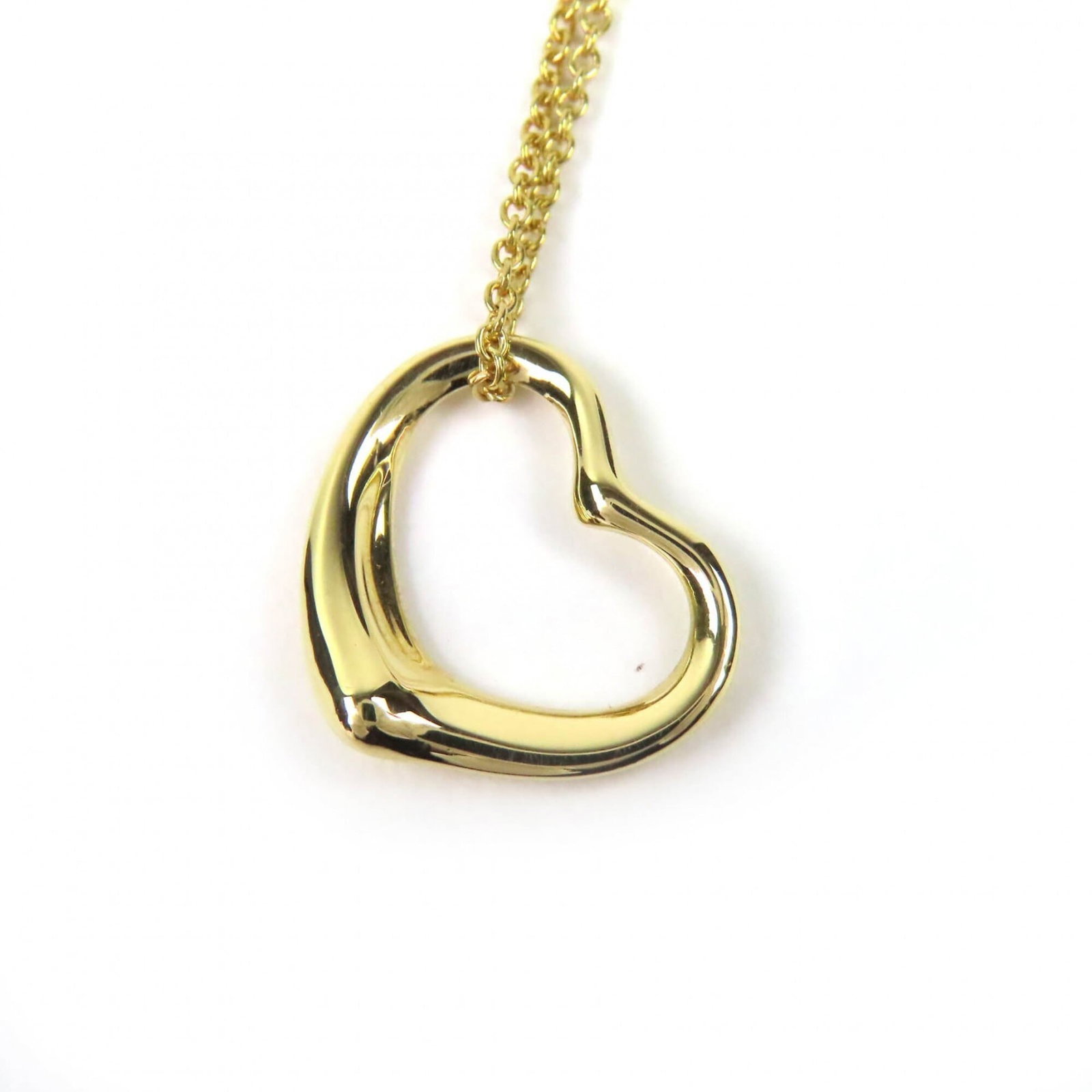 Elsa Peretti Open Heart Pendant Necklace 18K Yellow Gold 41cm Weight 2.91g Women's Tiffany & Co.: Elsa Peretti Open Heart Pendant Necklace 18K Yellow Gold 41cm Weight 2.91g Women's Tiffany & Co. 18K Yellow Gold Open Heart Pendant Necklace from Tiffany & Co. measures 41cm in circumference and featu