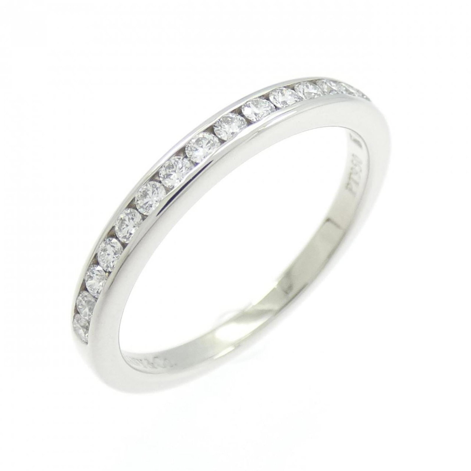 Platinum ring by Tiffany band: Platinum ring by Tiffany band Platinum ring by Tiffany features a diamond stone set in a high-quality band, crafted from 950 platinum. The ring bears a few traces of usage and minor scratches, but