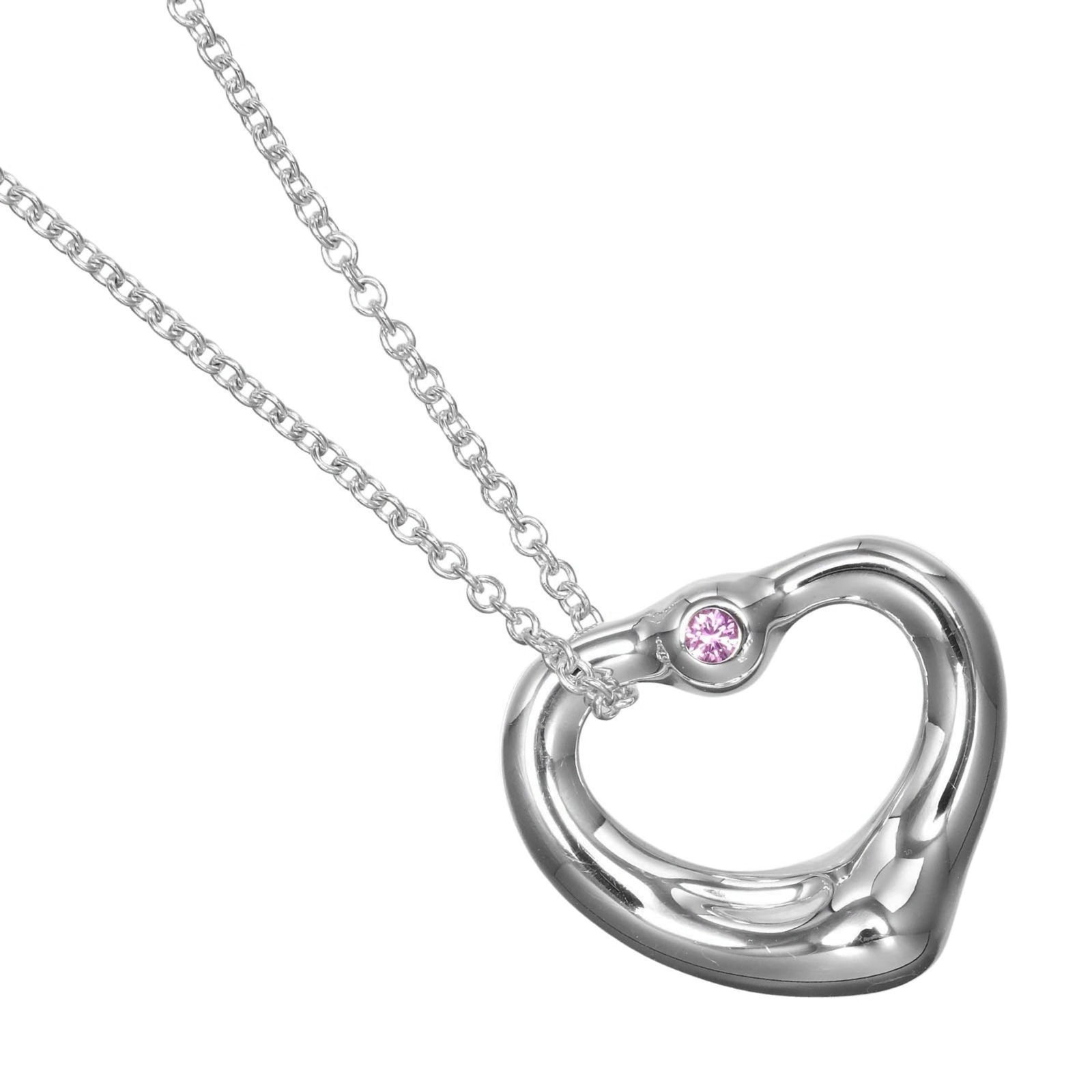 Tiffany & Co. Open Heart Necklace 925 Sterling Silver With Pink Sapphire Approx. 3.64G Women'S: Tiffany & Co. Open Heart Necklace 925 Sterling Silver With Pink Sapphire Approx. 3.64G Women'S Tiffany & Co. Open Heart Necklace in sterling silver features a beautiful pink sapphire stone, showcasing