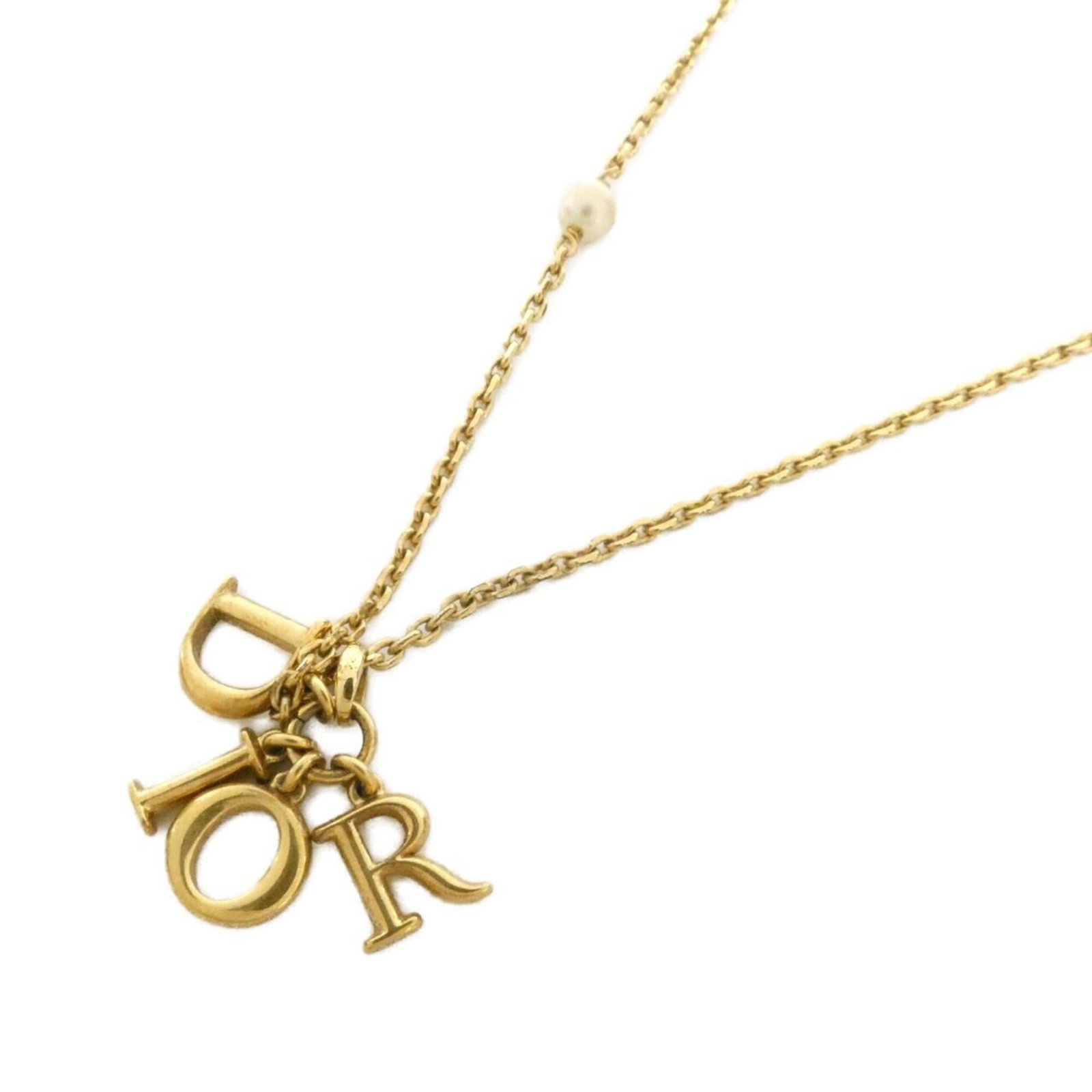 Christian Dior Revolution N1680Dvors Necklace: Christian Dior Revolution N1680Dvors Necklace The Christian Dior Revolution N1680Dvors Necklace boasts a sleek white design, featuring a 10mm x 9mm pendant that adds a touch of sophistication to any