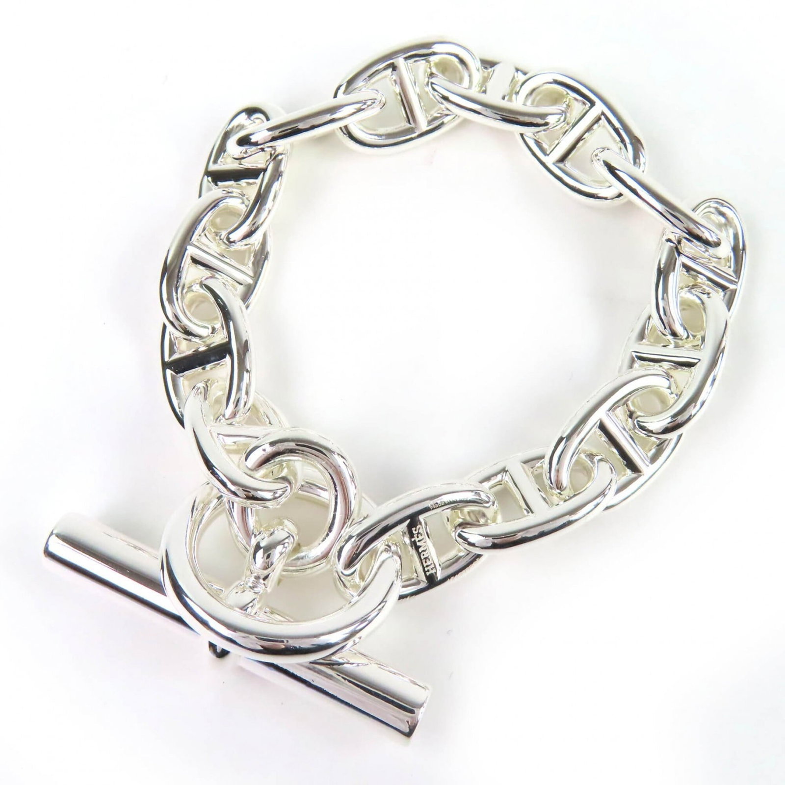 Silver Charm Bracelet 925 by Hermes: Silver Charm Bracelet 925 by Hermes Silver Charm Bracelet 925 by Hermes - A sleek and sophisticated accessory, this 16.5cm charm bracelet features a high-quality silver construction with a 925 hallmar