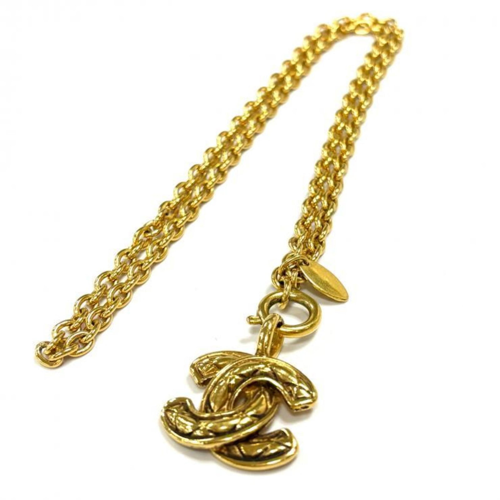 Matelasse Coco Chanel Necklace Mark Vintage Gold: Matelasse Coco Chanel Necklace Mark Vintage Gold Matelasse Coco Chanel Necklace in Vintage Gold. This 54cm gold plating necklace features a 20mm x 25mm pendant, showcasing the iconic Matelasse design 