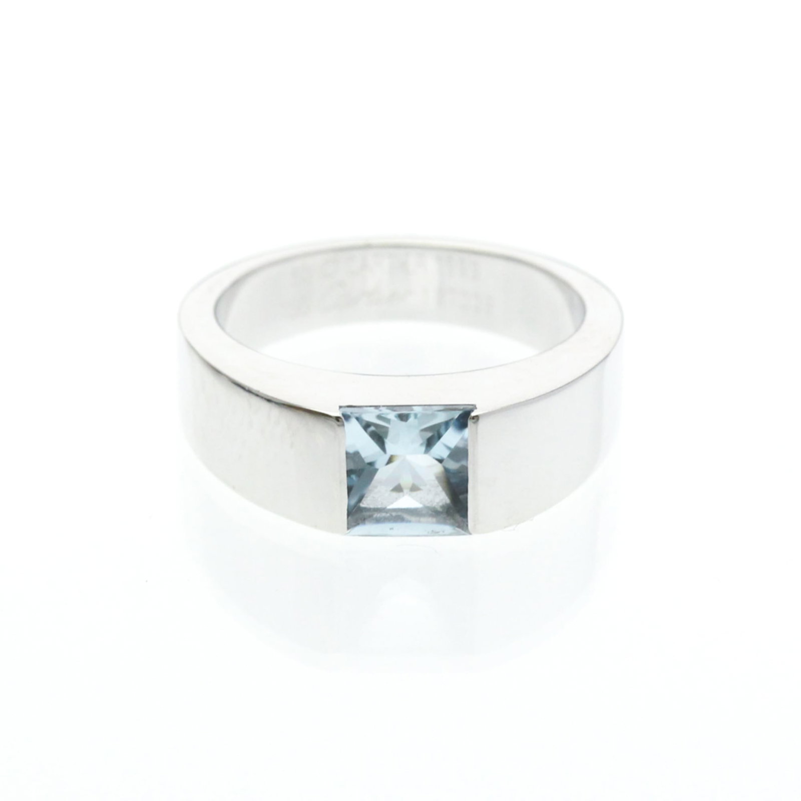 White Gold Cartier Band Ring 18K: White Gold Cartier Band Ring 18K 18K White Gold Cartier Band Ring features an Aquamarine stone, crafted from high-quality white gold. The ring's slender band and elegant design make it a