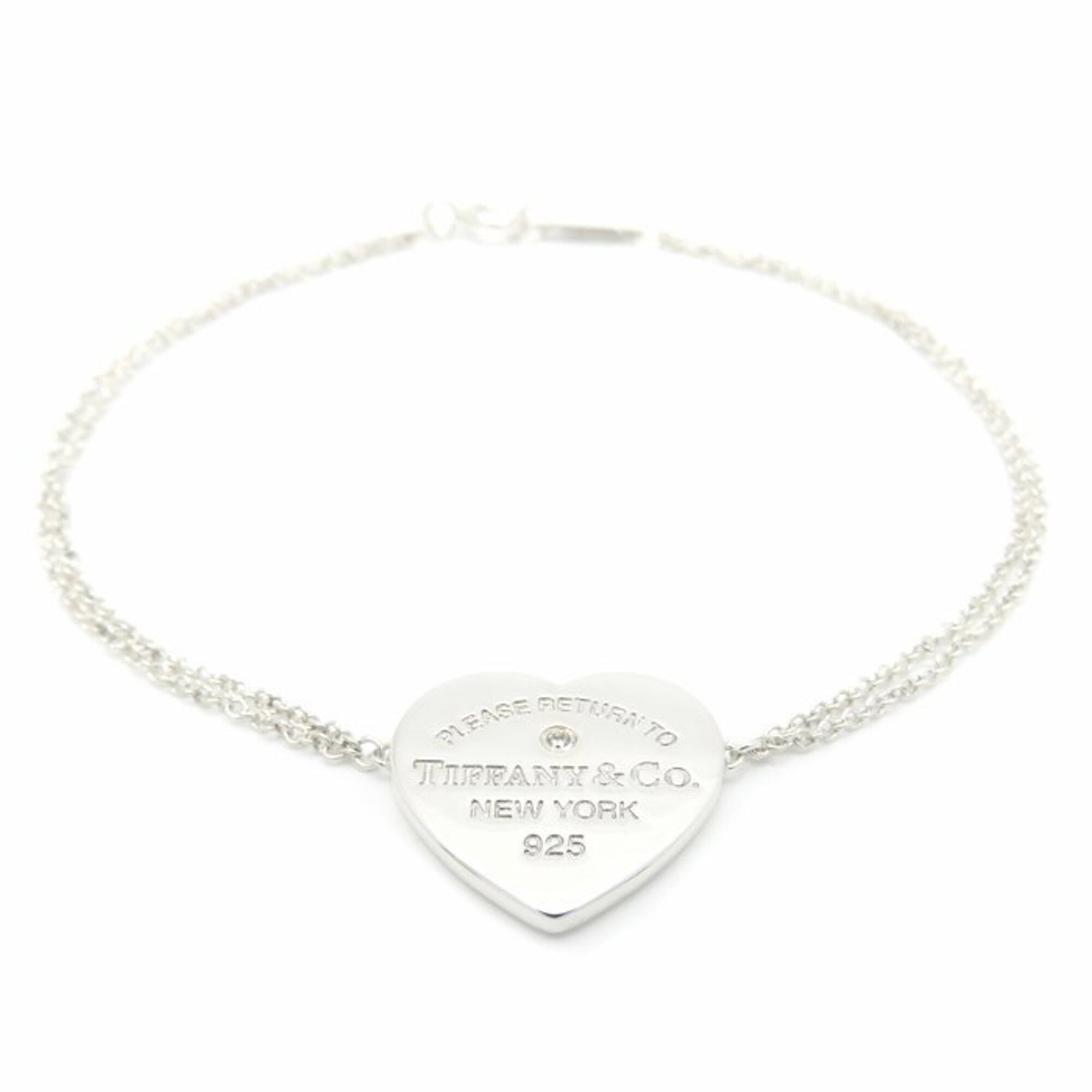 Charm Tiffany Bracelet 925 Silver: Charm Tiffany Bracelet 925 Silver Charm Tiffany Bracelet 925 Silver - A charming, used 925 silver charm bracelet in excellent condition, featuring a few subtle signs of wear and minor scratches. The