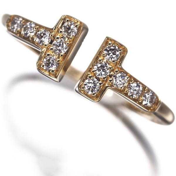 Tiffany&Co. Ring Diamond Tiffany T Wire Us4-4.25 18K 750 Yellow Gold: Tiffany&Co. Ring Diamond Tiffany T Wire Us4-4.25 18K 750 Yellow Gold Tiffany & Co.'s iconic yellow gold ring features a stunning diamond, part of the Tiffany T Wire collection. This 18k piece boasts e
