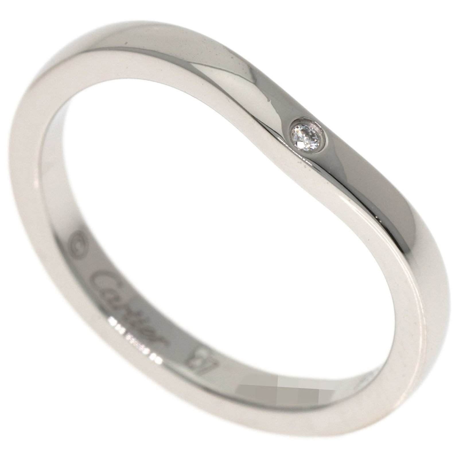 Ring Band by Platinum 950: Ring Band by Platinum 950 Platinum 950 band ring with diamond stone, measuring 2.1mm in width and weighing 3.1g. The ring bears a signature but authenticity cannot be confirmed. Used condition with so