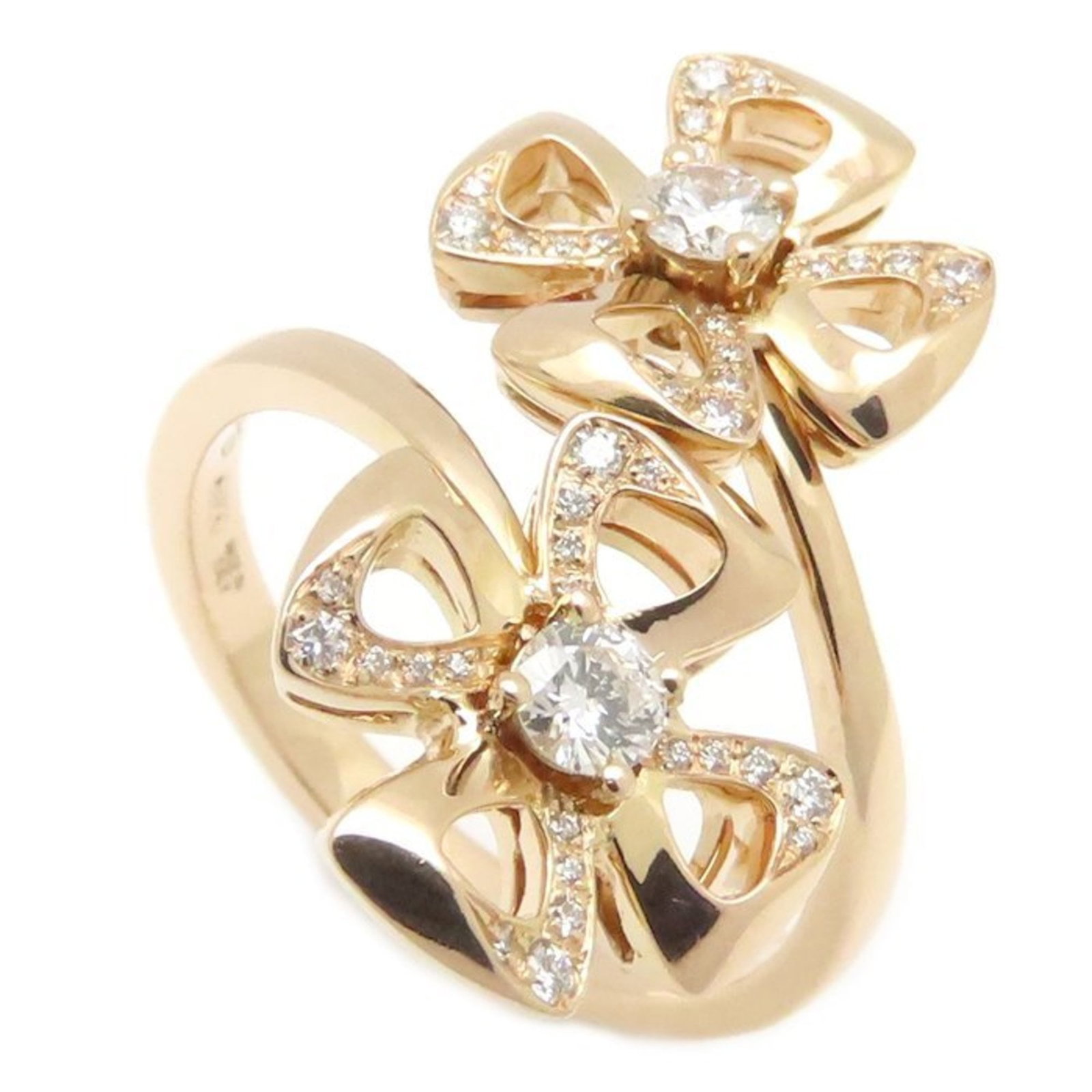 Pink Gold 18K Bvlgari Band Ring: Pink Gold 18K Bvlgari Band Ring Pink Gold 18K Bvlgari Band Ring features an elegant pink gold band adorned with a diamond, weighing 0.21 carats. The ring's 52mm size fits a US size 6.5 comfortably. In