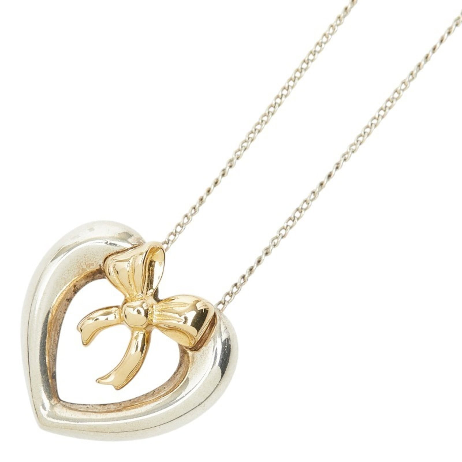 Tiffany & Co. Heart Ribbon Necklace Silver Gold (Sv925 18K Yellow Gold) - Women'S Necklace: Tiffany & Co. Heart Ribbon Necklace Silver Gold (Sv925 18K Yellow Gold) - Women'S Necklace Tiffany & Co. Heart Ribbon Necklace in 18K Yellow Gold features a delicate, intricate design with a subtle