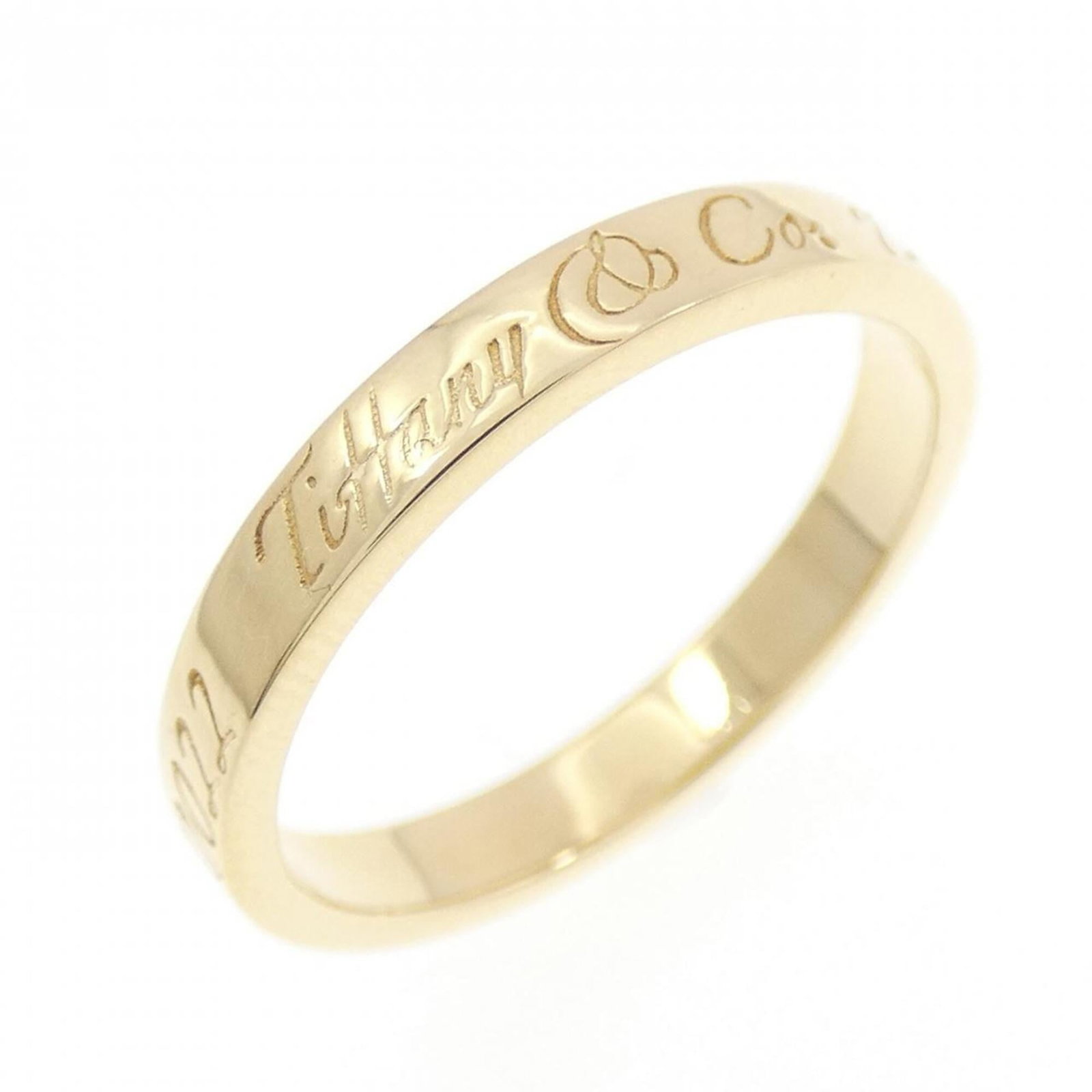 Tiffany Ring Gold Yellow 18K: Tiffany Ring Gold Yellow 18K Yellow Gold 18K Tiffany Band Ring for Women, 4 Us Size. This used band ring features yellow gold (18K) and bears a signature. In like new condition with hardly any traces 