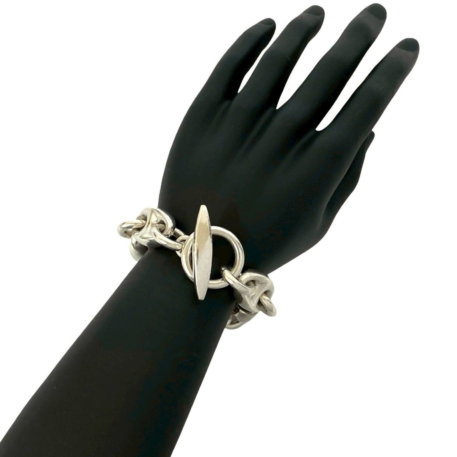 Silver Charm Bracelet 925 by Hermes: Silver Charm Bracelet 925 by Hermes Silver Charm Bracelet 925 by Hermes, featuring a classic design with subtle wear from previous use. The bracelet measures 22cm in length and is made from high-quali