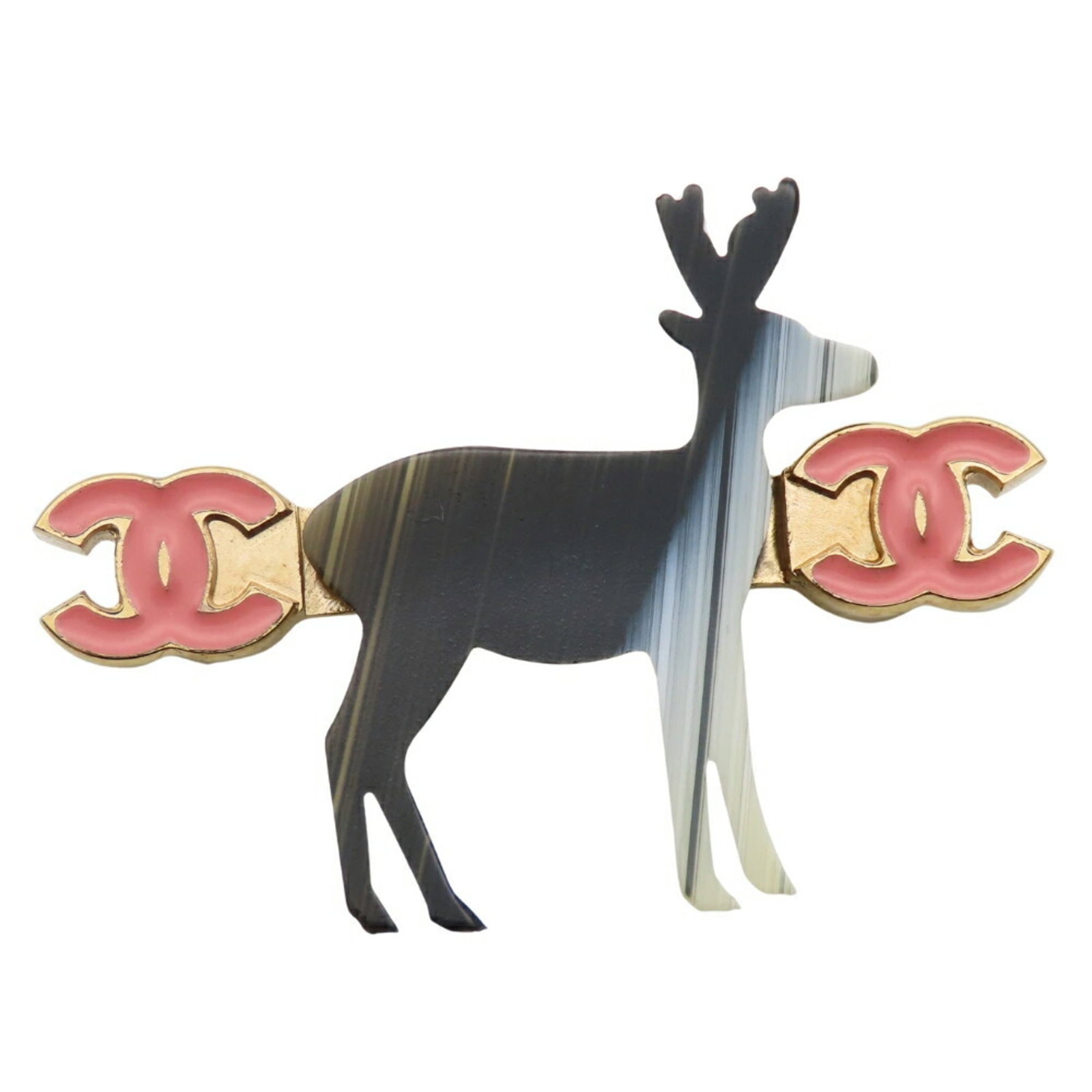 Metal brooch by Chanel: Metal brooch by Chanel Metal brooch by Chanel, featuring a striking black, gold, and pink design. The brooch measures 3.25cm x 4.55cm and bears traces of usage with minor scratches and dirt. In good c