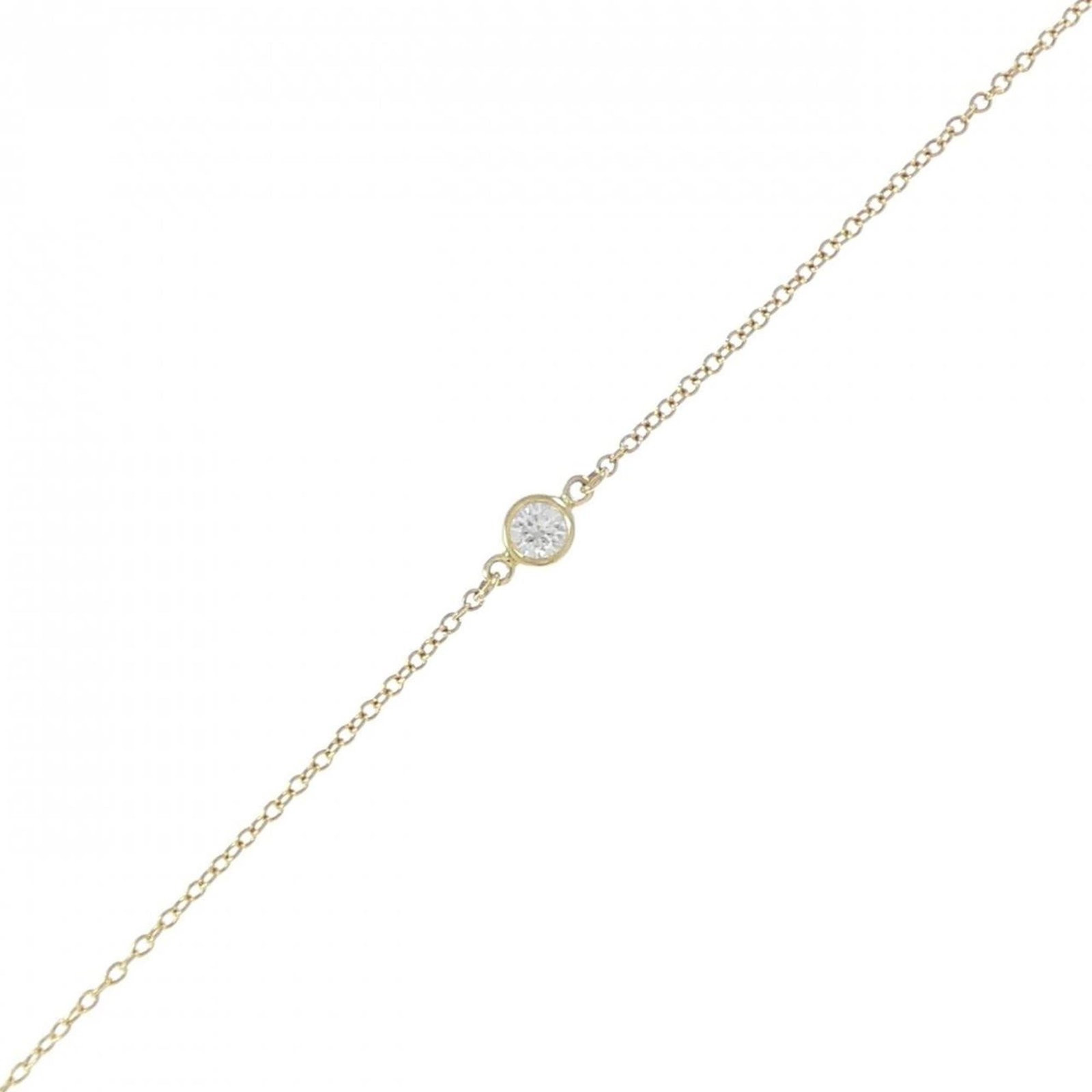 Tiffany Charm Bracelet Yellow Gold (18K): Tiffany Charm Bracelet Yellow Gold (18K) Yellow Gold (18K) Tiffany Charm Bracelet - A delicate and elegant accessory, this 20cm charm bracelet features a beautiful yellow gold finish. The bracelet