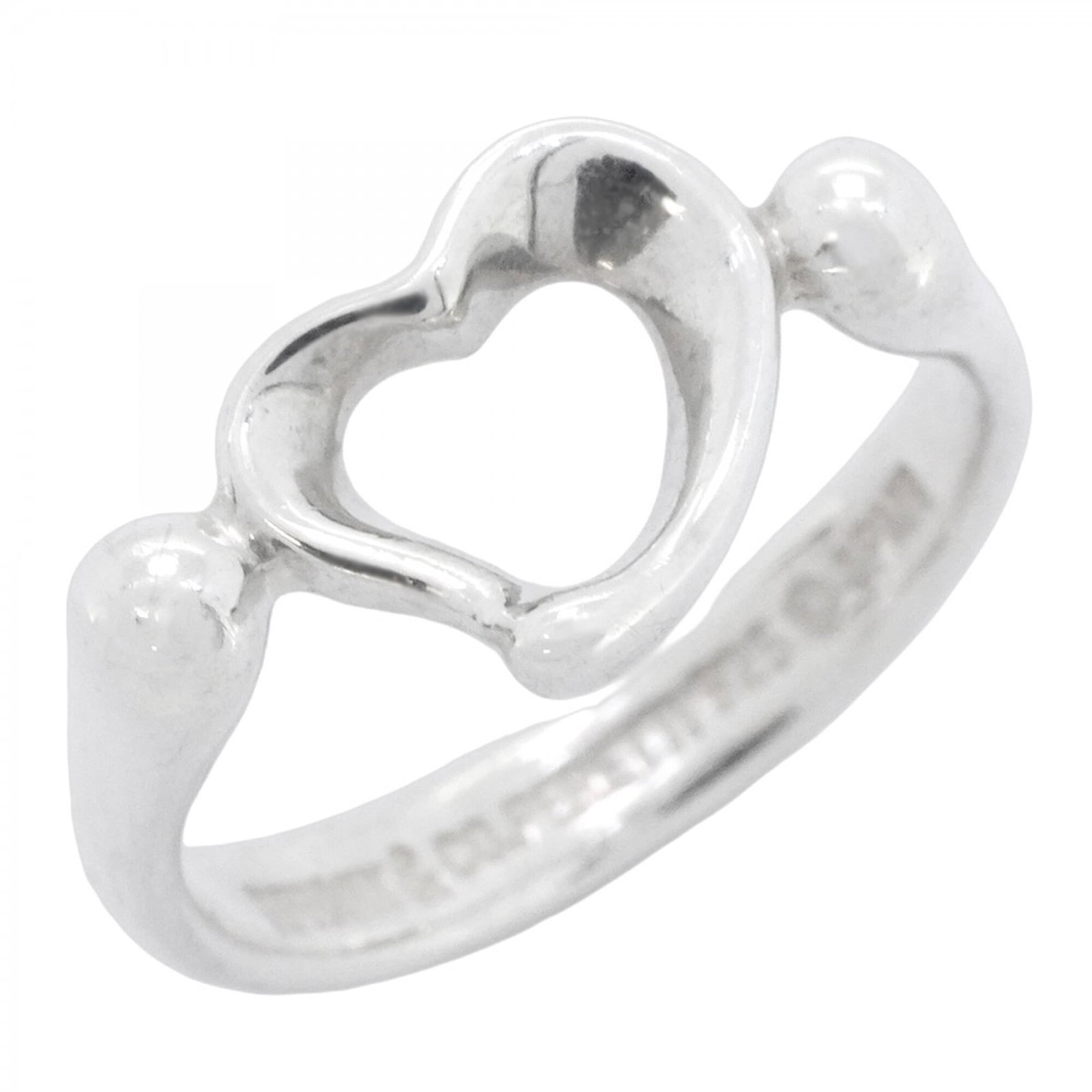 Tiffany Band Ring Silver 925: Tiffany Band Ring Silver 925 Silver 925 band ring from Tiffany, featuring a classic design with subtle wear and minor scratches. The item bears the brand's mark and is made from high-quality silver