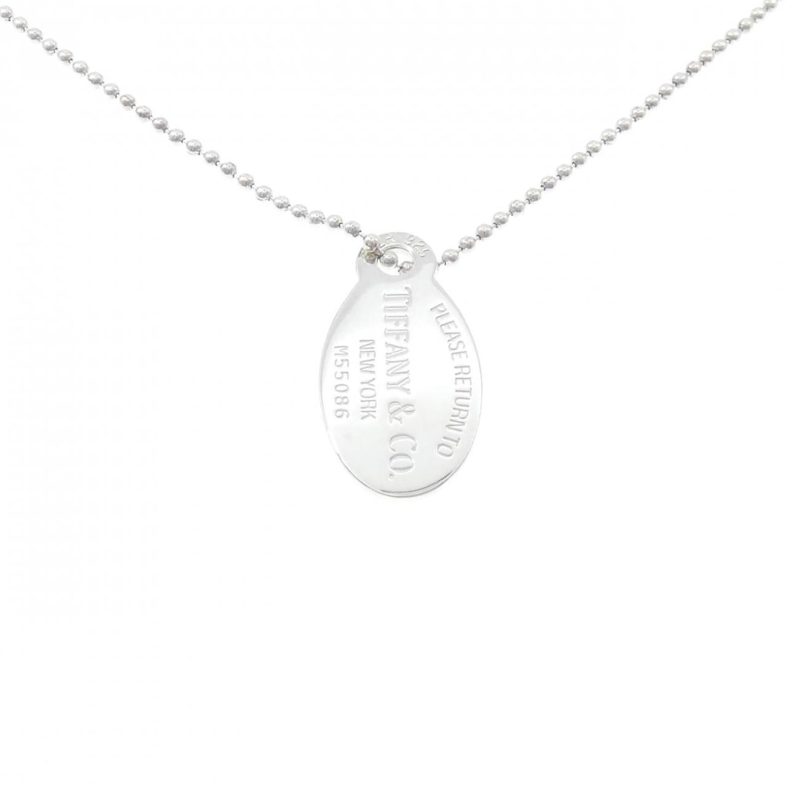 Return To Tiffany Necklace: Return To Tiffany Necklace Silver 925 Return To Tiffany Necklace, featuring a pendant with a silver finish and a subtle design. The necklace has a nice silver color and a comfortable neck