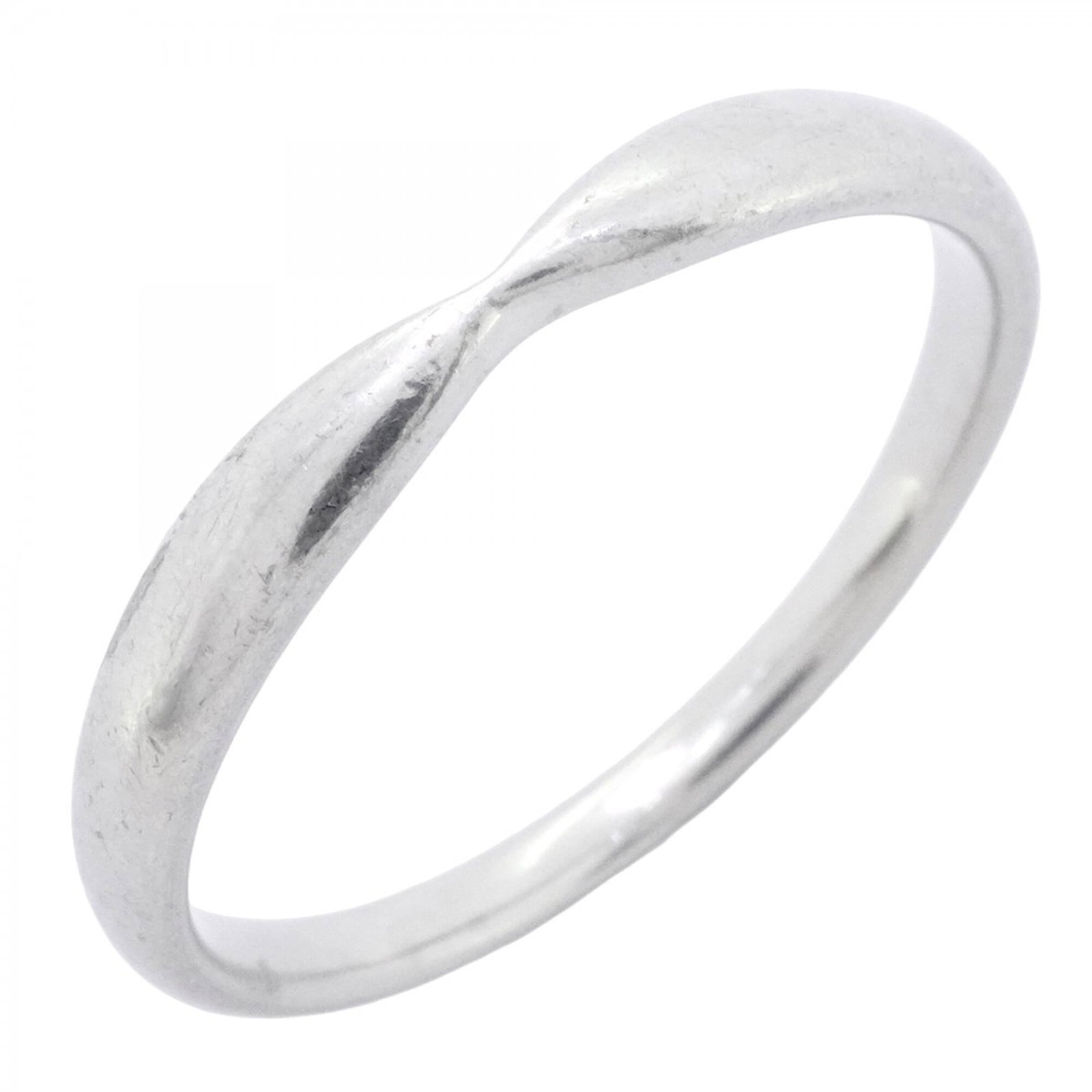 Platinum ring by Tiffany band: Platinum ring by Tiffany band Platinum ring by Tiffany features a high-quality band made from 950 platinum, showcasing the luxury and sophistication of this iconic brand. The item bears a signature, b
