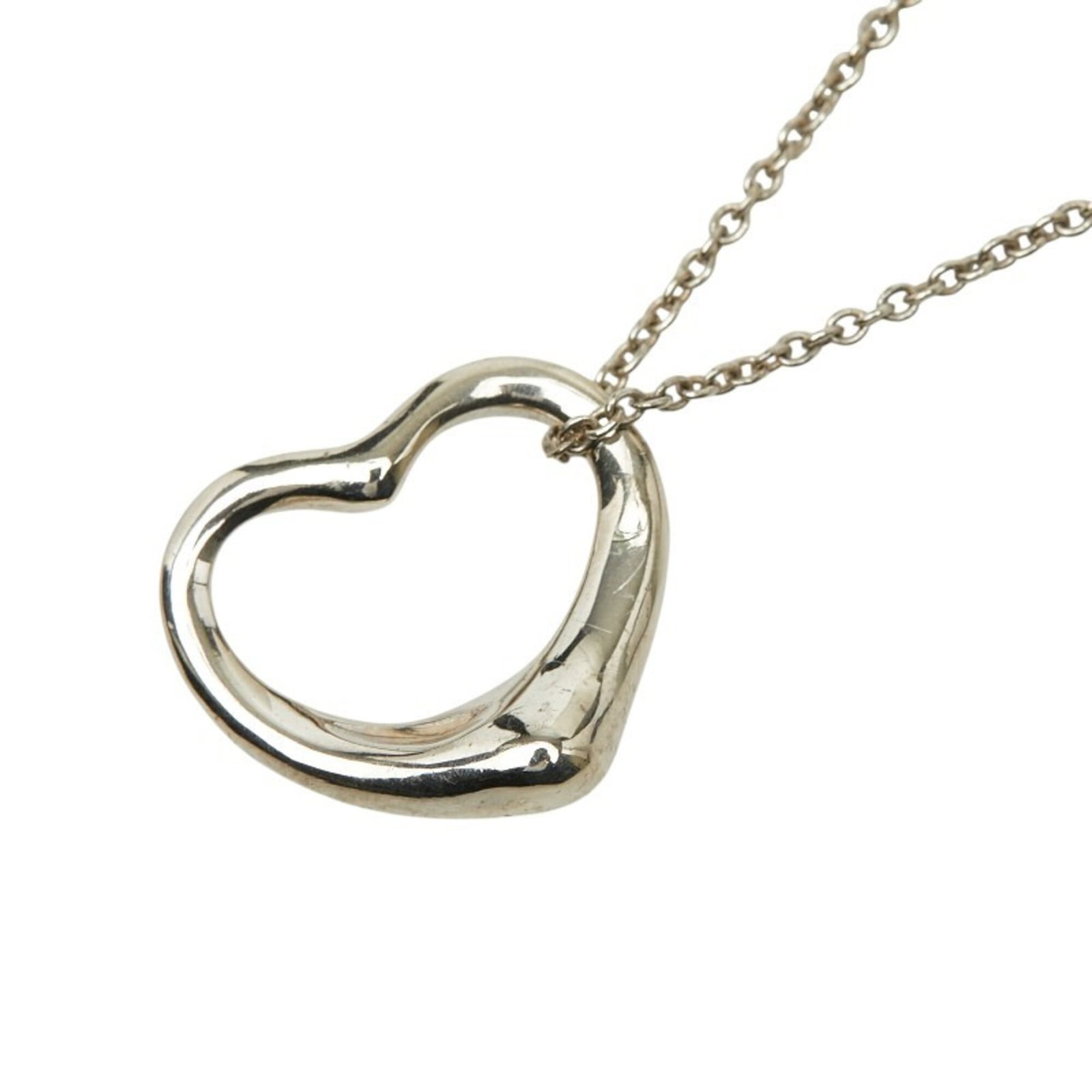 Tiffany and Co open heart necklace women's silver Sv925.: Tiffany and Co open heart necklace women's silver Sv925. Tiffany and Co's open heart necklace is a classic design featuring sterling silver (925) construction. The necklace boasts a 42 cm circumferenc