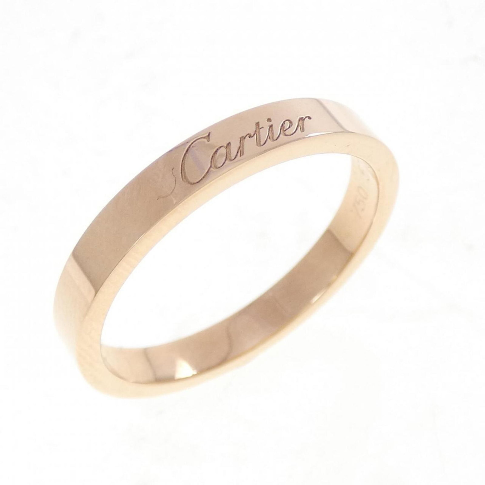 Pink Gold (18K) Cartier Wedding Ring: Pink Gold (18K) Cartier Wedding Ring Pink Gold (18K) Cartier Wedding Ring, featuring a timeless design in 18k pink gold, with a few traces of usage and minor scratches. The ring bears a signature,