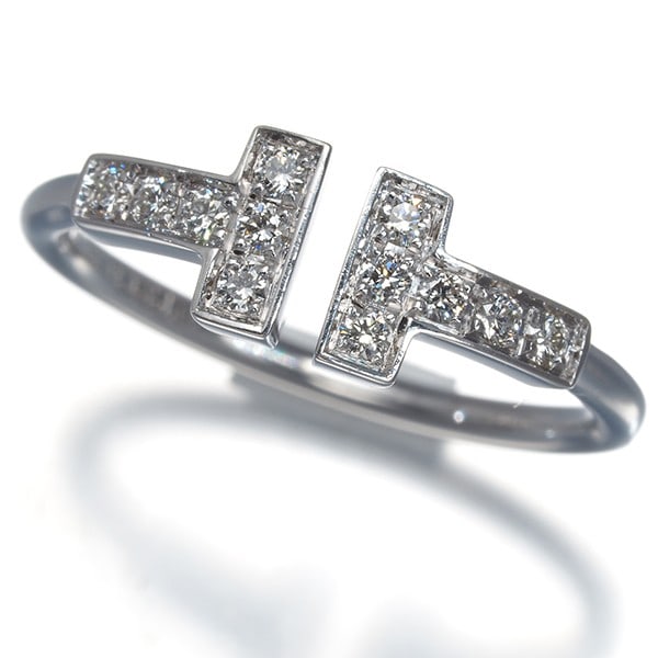Tiffany&Co. Ring Diamond Tiffany T Wire Us4.75 18K 750 White Gold: Tiffany&Co. Ring Diamond Tiffany T Wire Us4.75 18K 750 White Gold Tiffany & Co.'s iconic Tiffany T wire design adds an elegant touch to this stunning white gold ring, featuring a beautiful diamond mai