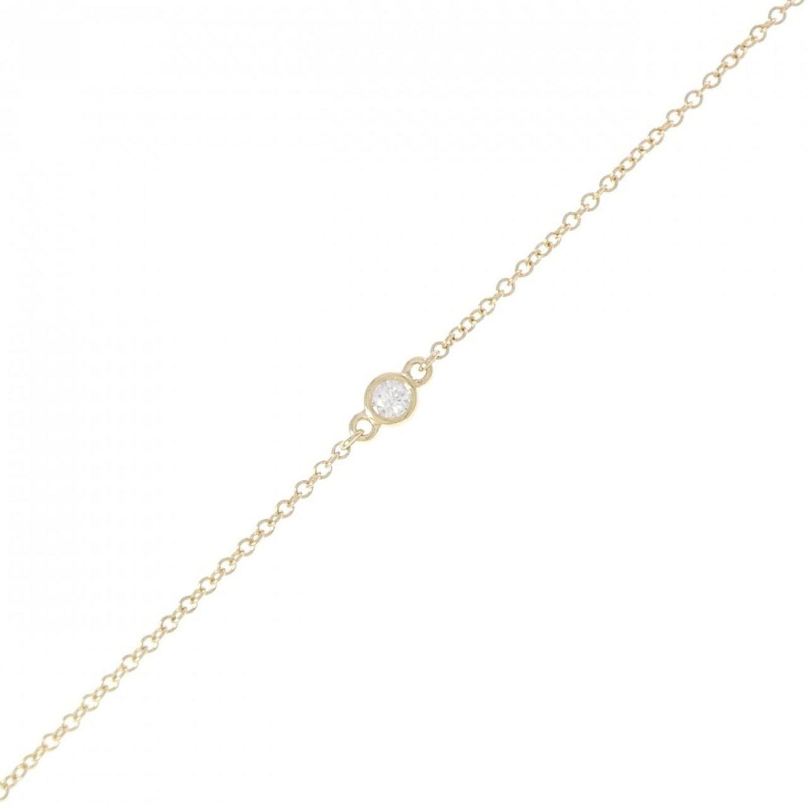 Tiffany Charm Bracelet Yellow Gold (18K): Tiffany Charm Bracelet Yellow Gold (18K) Yellow gold (18K) charm bracelet from Tiffany, featuring a subtle elegance with a few traces of usage visible. The bracelet has some scratches and dirt, but ov
