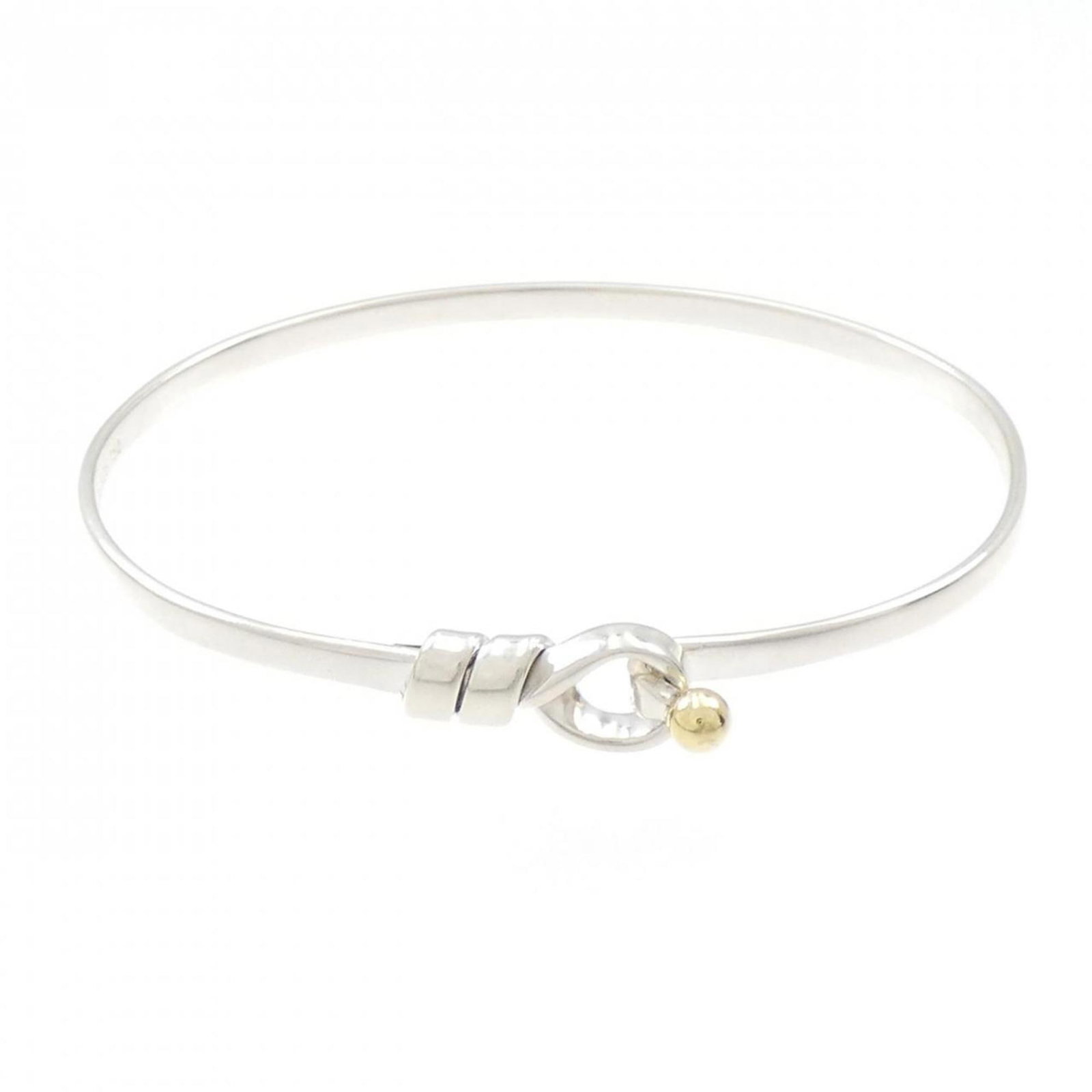 Tiffany Bangle Silver 925 Yellow Gold (18K): Tiffany Bangle Silver 925 Yellow Gold (18K) Tiffany Bangle Silver 925 Yellow Gold (18K) - A stylish and elegant bangle from the renowned luxury brand, featuring a combination of silver 925 and yellow 